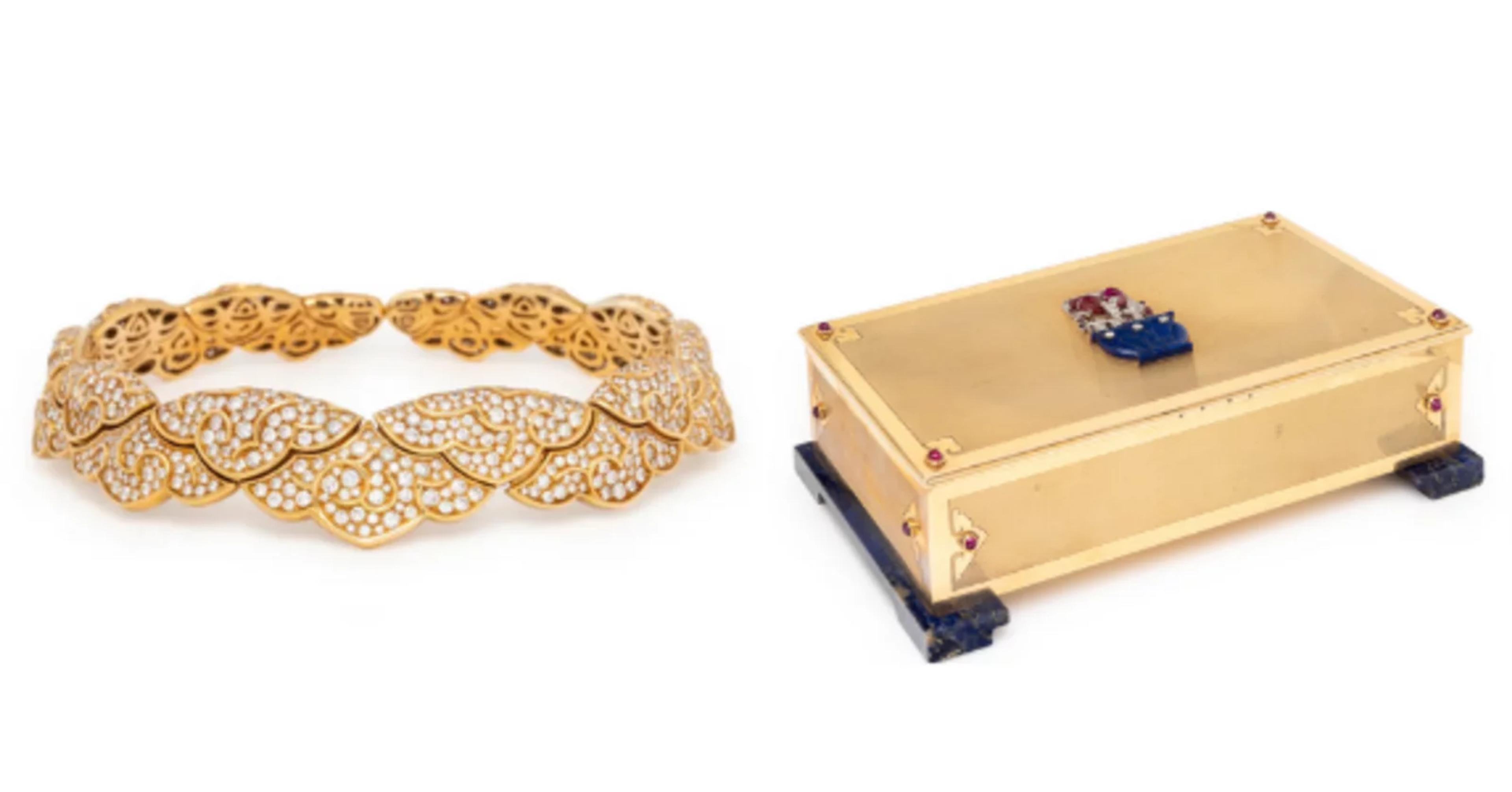 From Left to Right: Lot 76 | Marina B, Diamond and Yellow Gold 'Esclave' Choker Necklace | Sold for $89,600 Lot 34 | Cartier, Art Deco, Yellow Gold and Multigem Table Box | Sold for $73,600