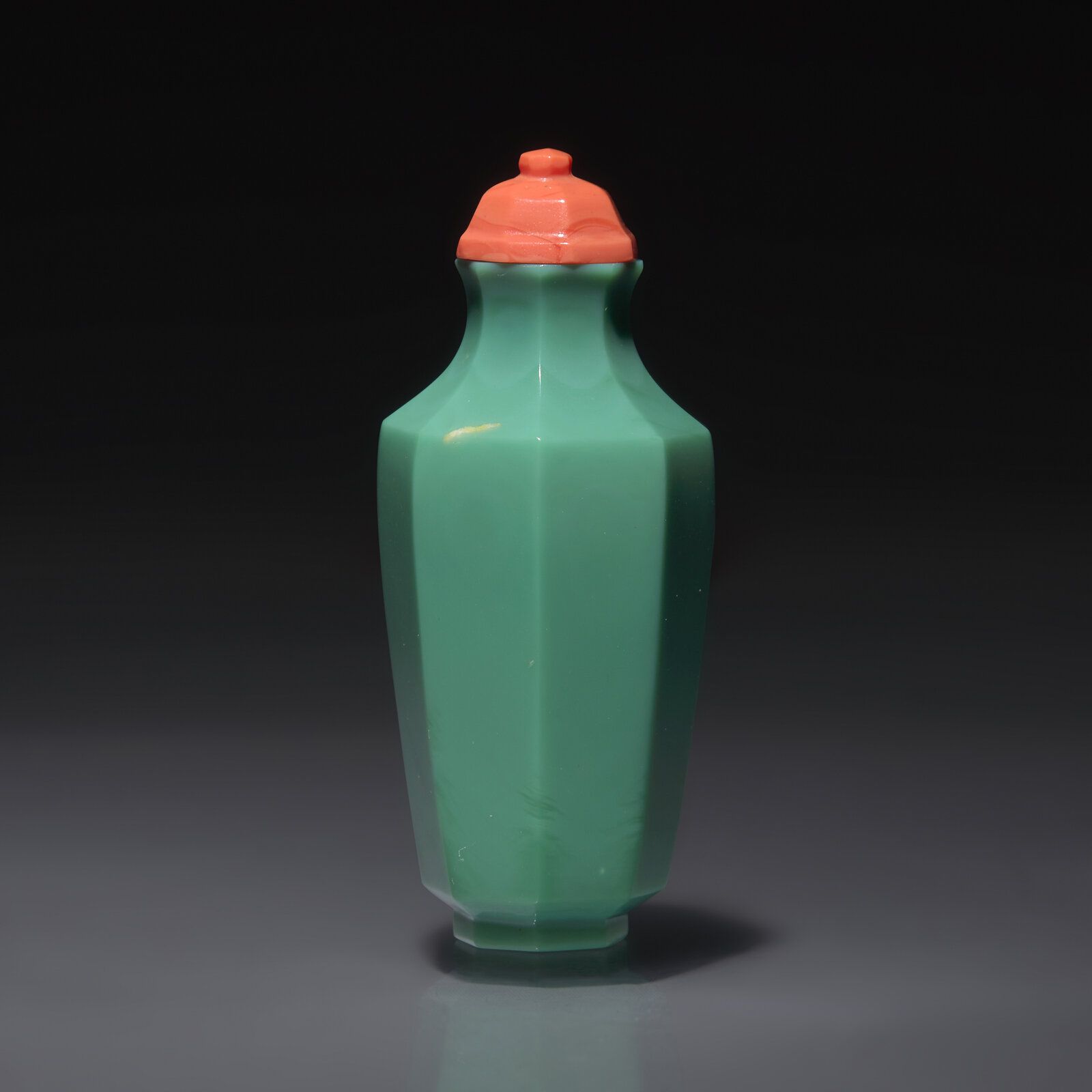 Lot 40 An Imperial Chinese Turquoise Glass Faceted Snuff Bottle, Qing Dynasty, Circa 1720-1740 1720-1740年 御製松石綠料八方磨棱鼻煙壺