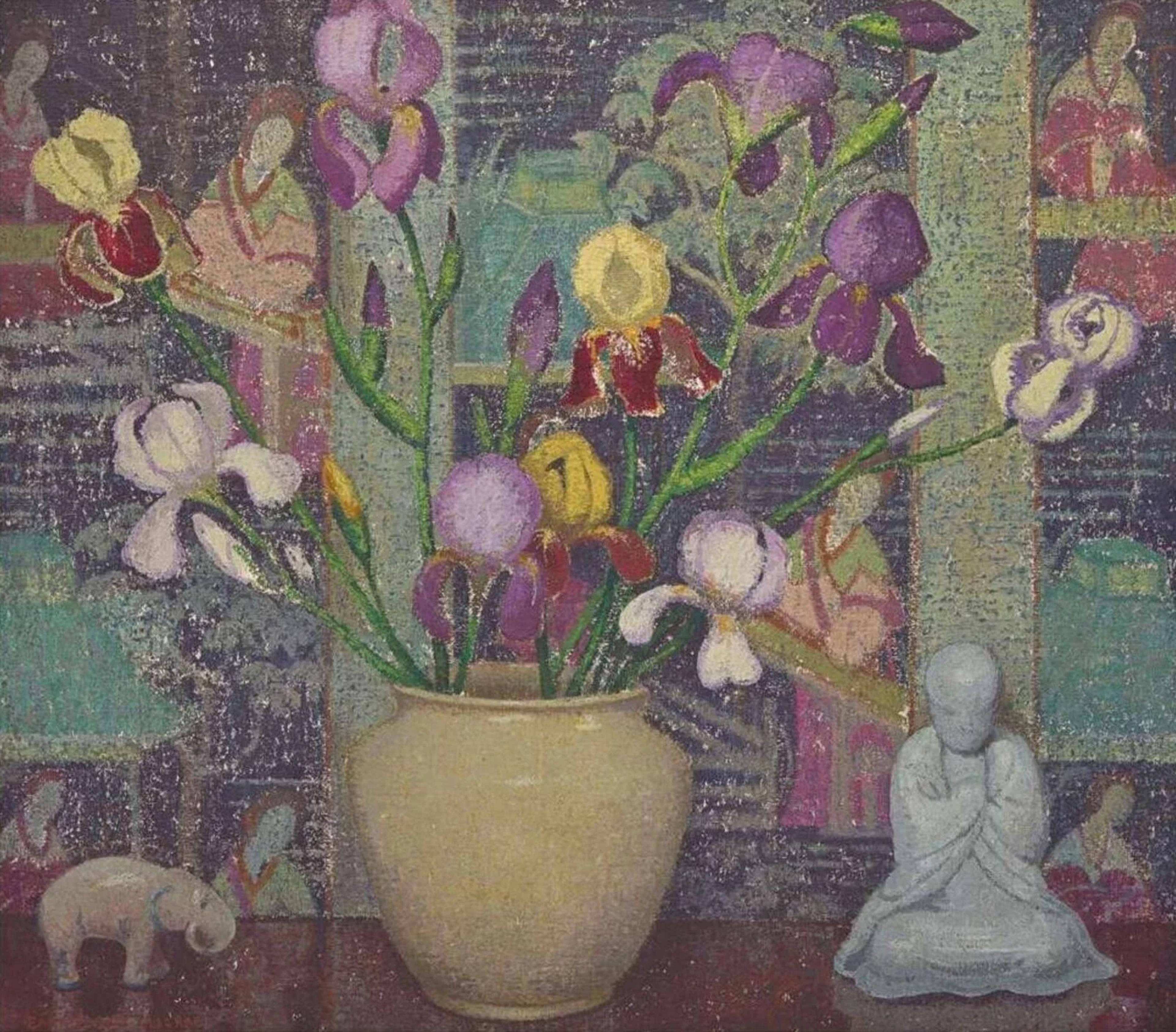 a painting featuring a floral arraignment and small sculptures including an elephant and buddha 