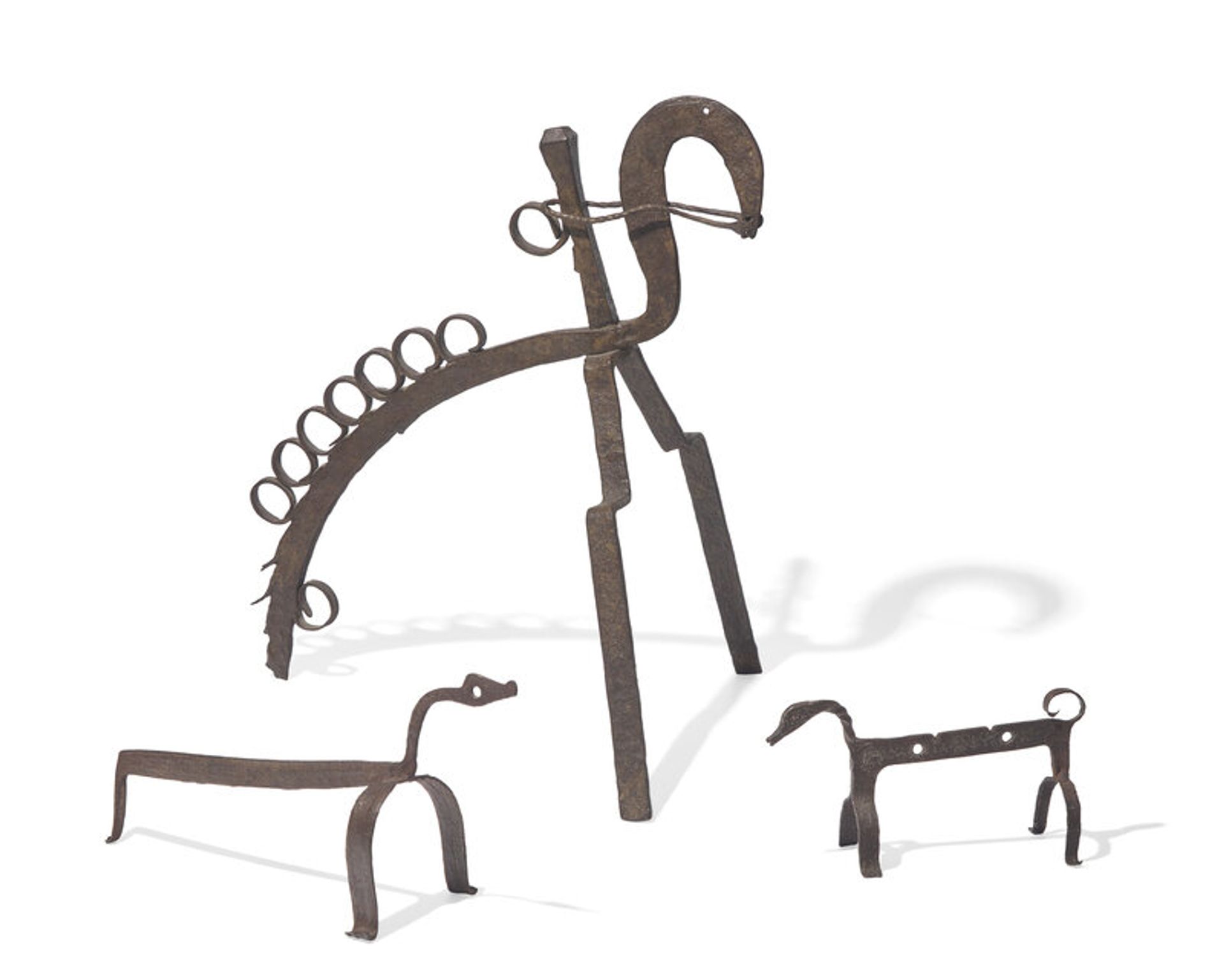Lot 43 | A Group of Three Wrought Iron Spit Holders, French or Basque Region, 18th Century, Estimate: $2,000 - $3,000