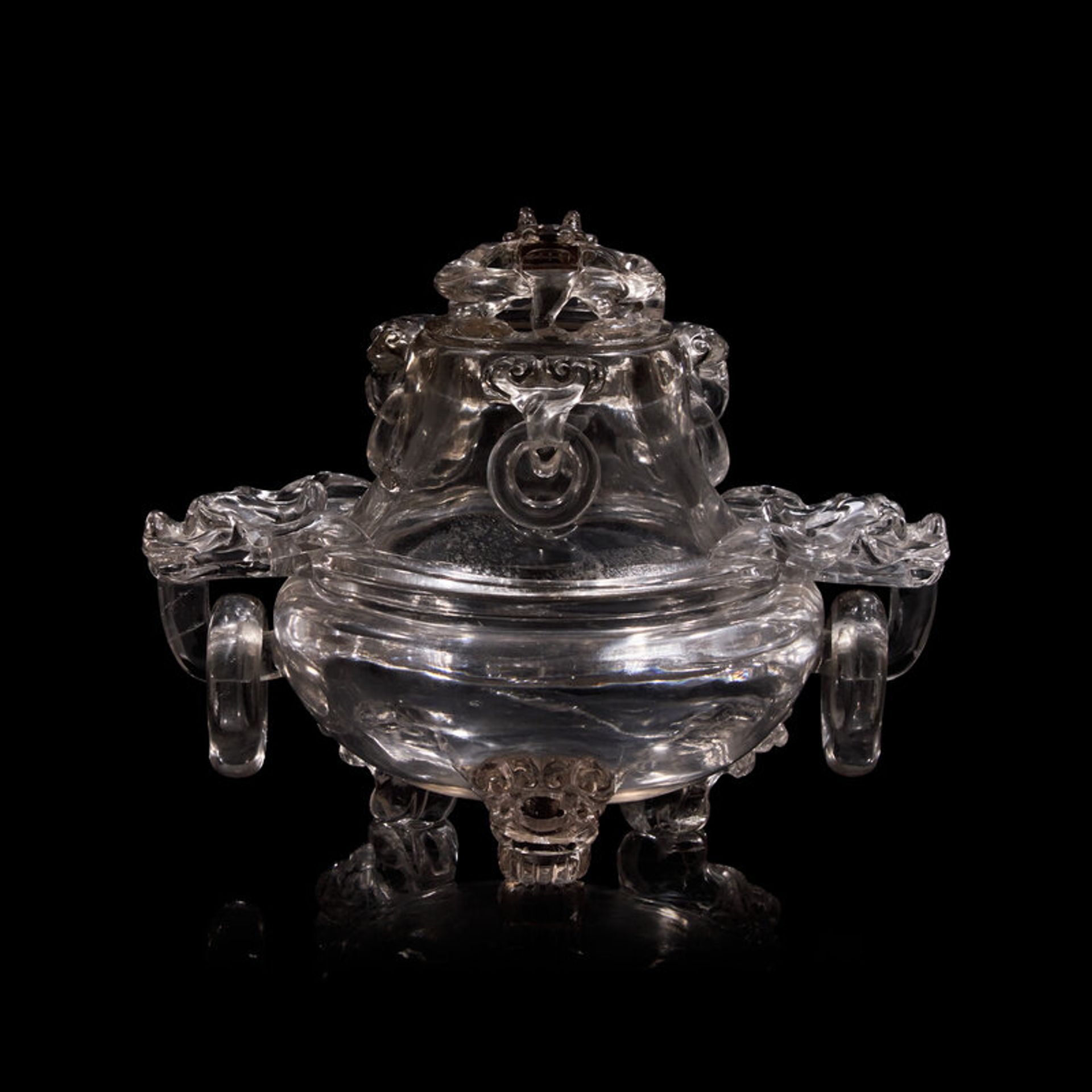 Lot 164 | A Chinese Rock Crystal Censer and Openwork Cover, Early 20th Century, 晚清-民國 水晶鏤空龍紋銜環三足香爐, Estimate: $1,500 - $2,000