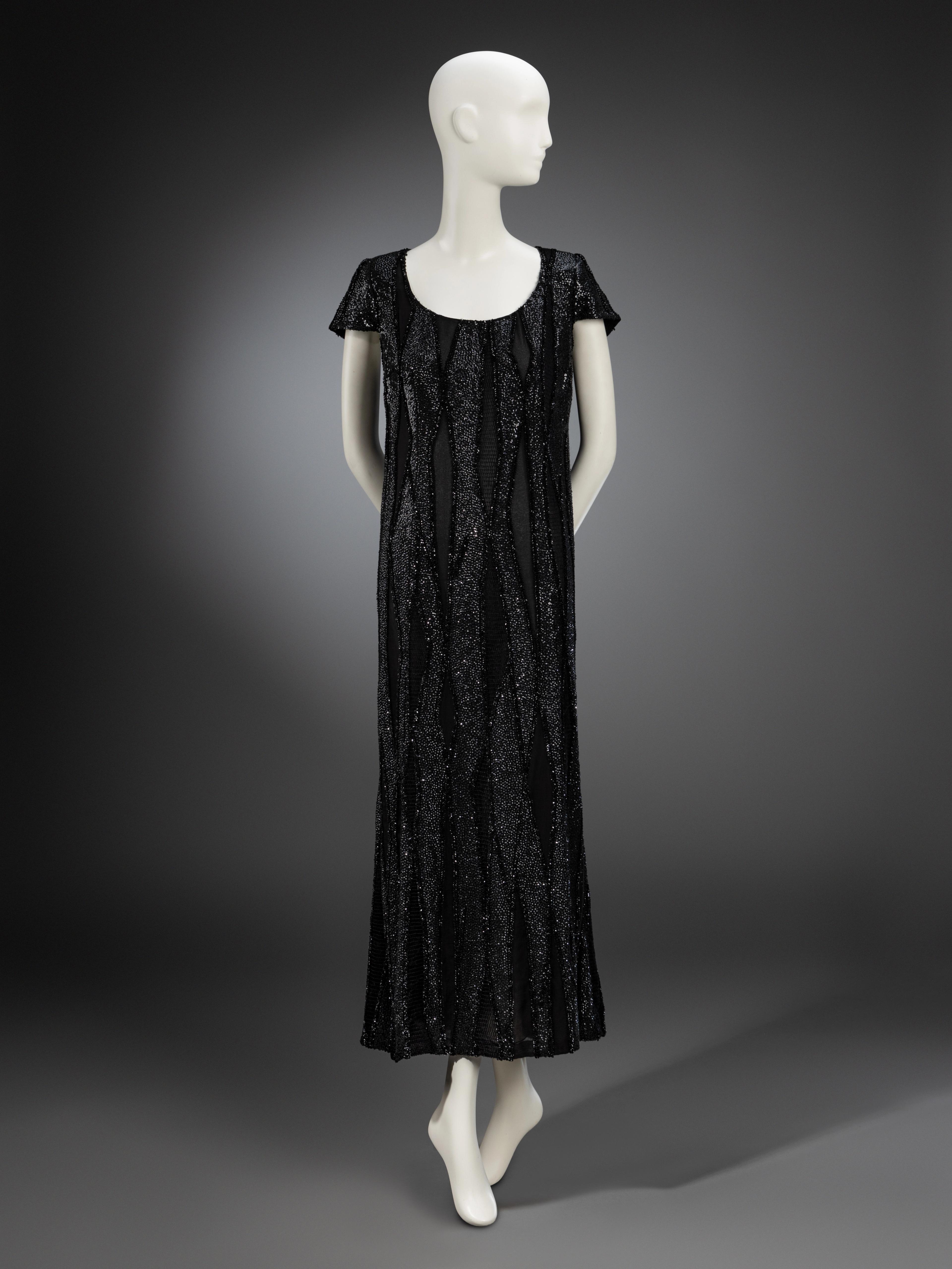 Lot 214 | Valentino Couture, Haute Couture Black Beaded Column Gown, Fall/Winter 2007 | Estimate: $700–900