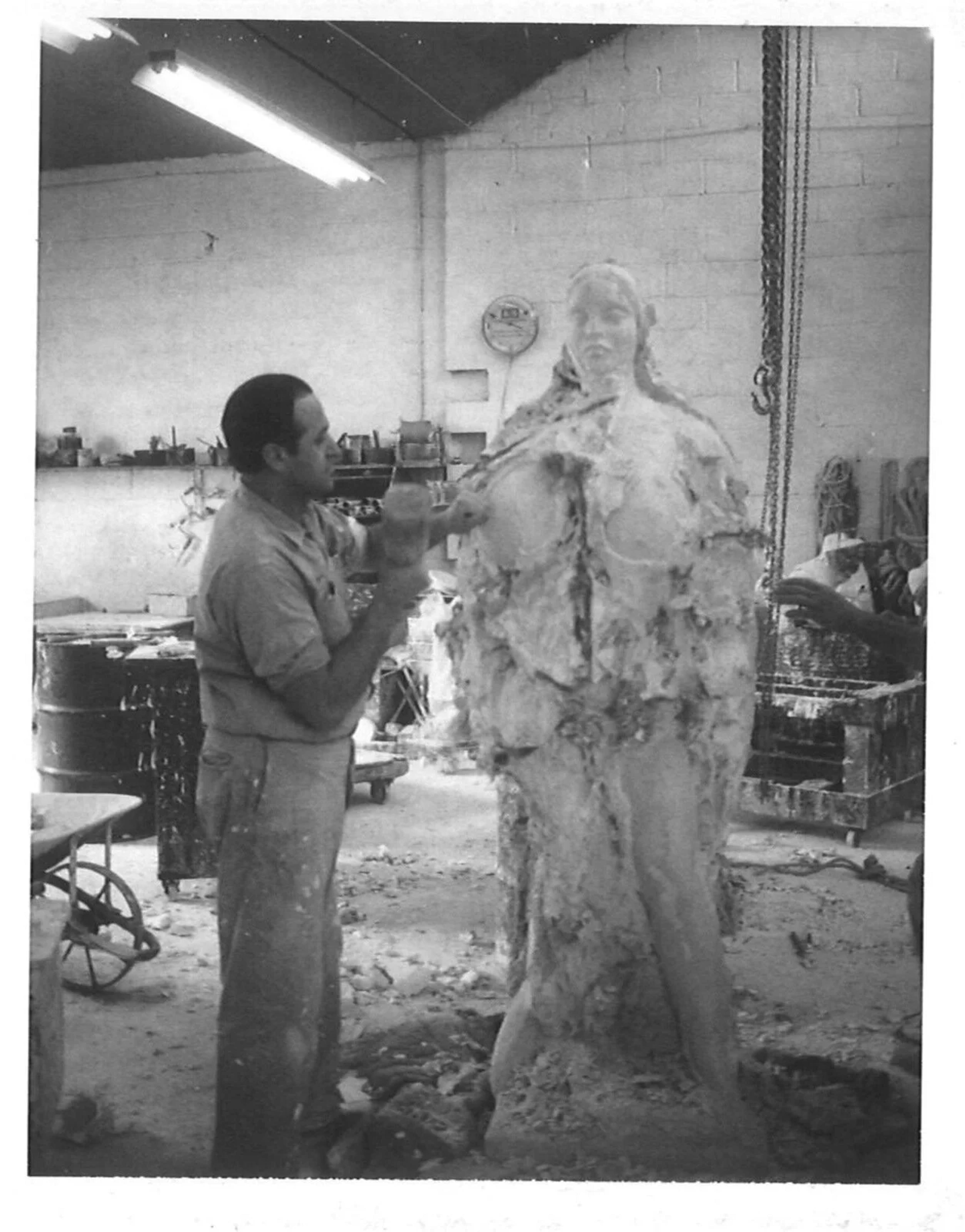 From left to right: Gaston Lachaise | Head of Woman, 1922 | Estimate: $15,000 - 25,000
Plaster model of Garden Figure being released from Lachaise's mold at the Modern Art Foundry, c. 1934-35 | Estimate: $150,000 - 250,000