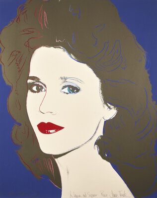 A pop-art style screenprint portrait of a woman against a solid blue background. She has voluminous, curly brown hair with dark red highlights, pale skin rendered in bold outline, blue eyes, arched eyebrows, and bright red lips. Cursive handwritten text is visible near the bottom of the image.