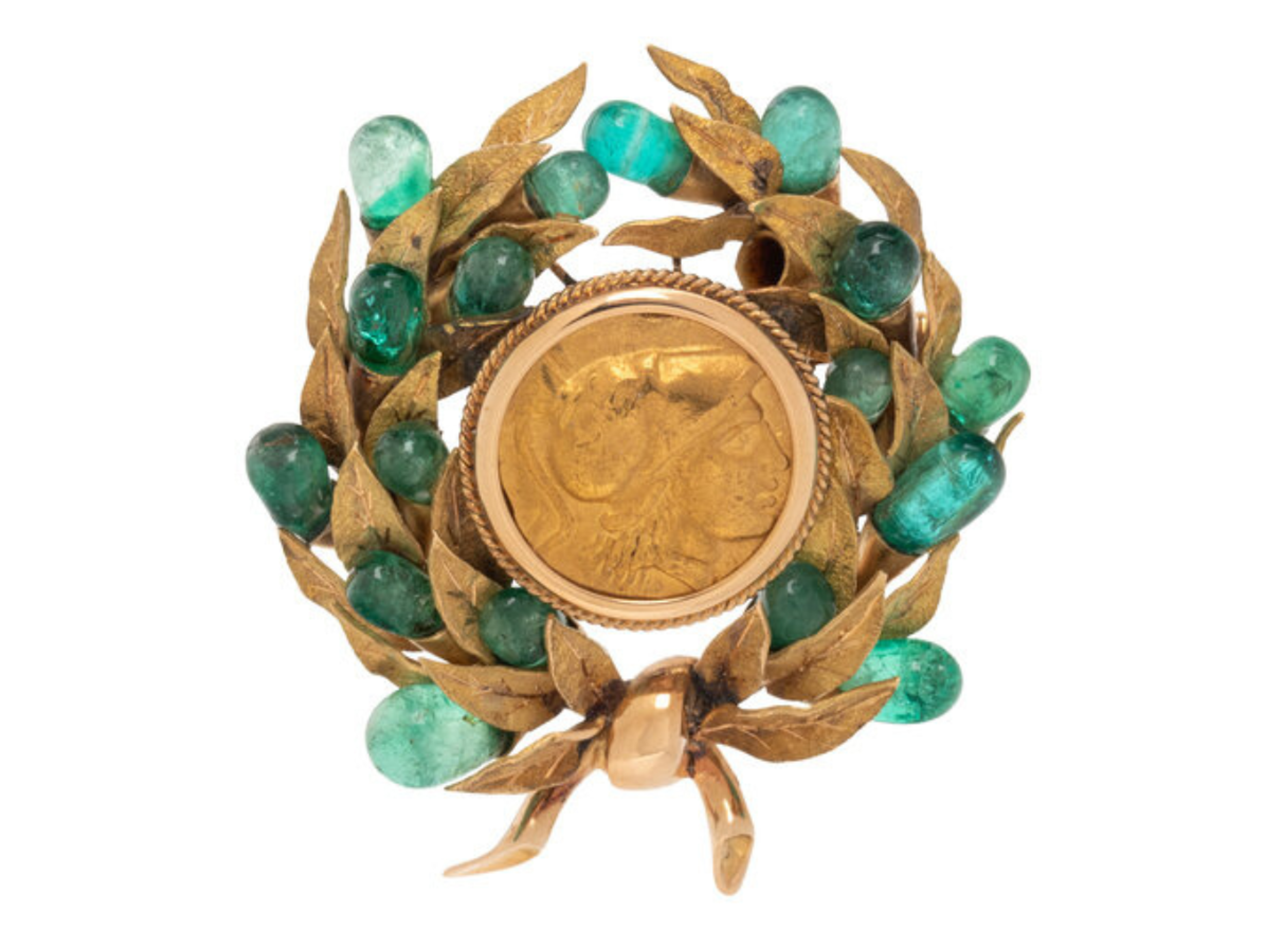 Lot 18 | OWNED AND WORN BY JACQUELINE KENNEDY, EMERALD, YELLOW GOLD AND GREEK COIN BROOCH | Sold for $20,955