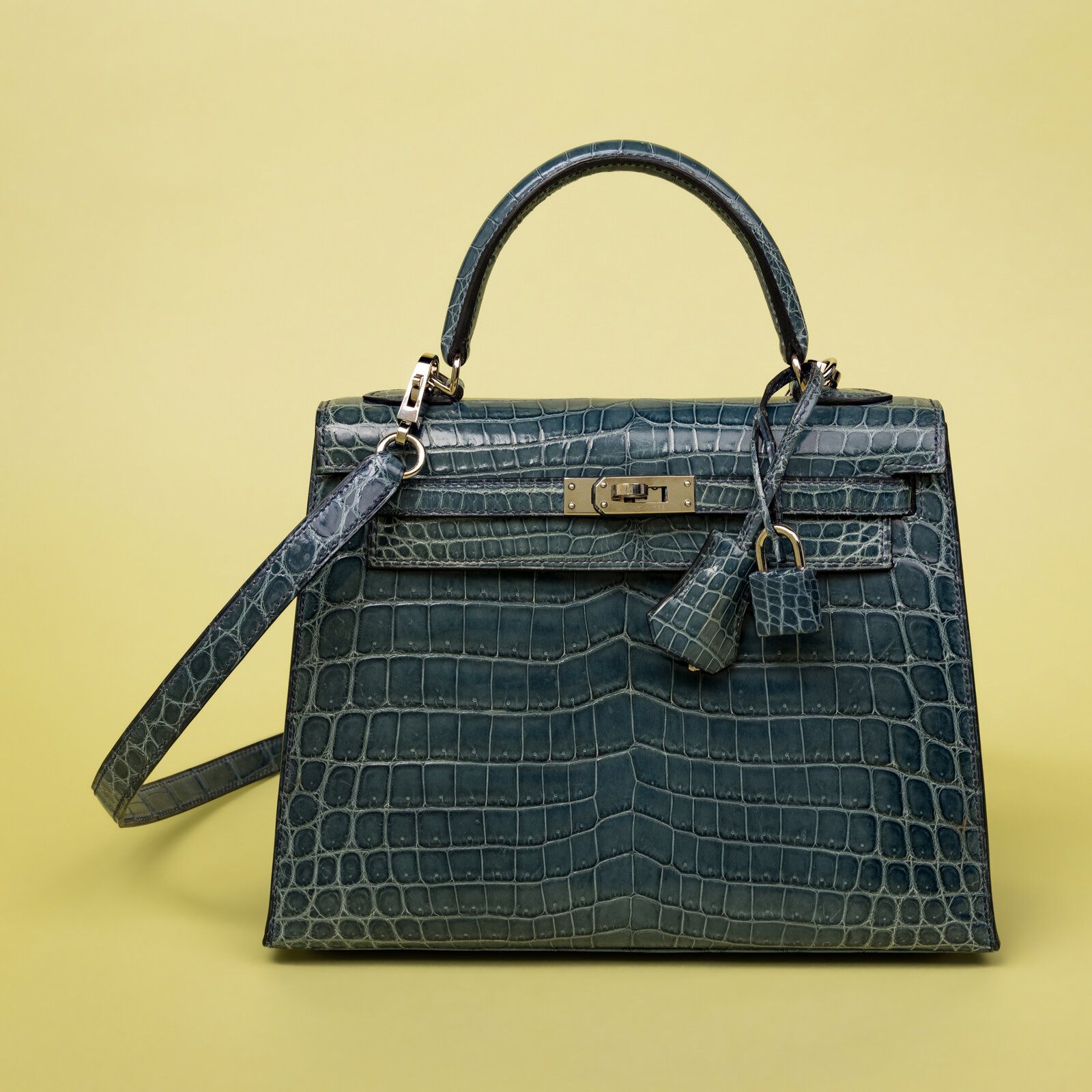 Lot 101 Hermès, Kelly 25 in Bleu Colvert Crocodile with Strap