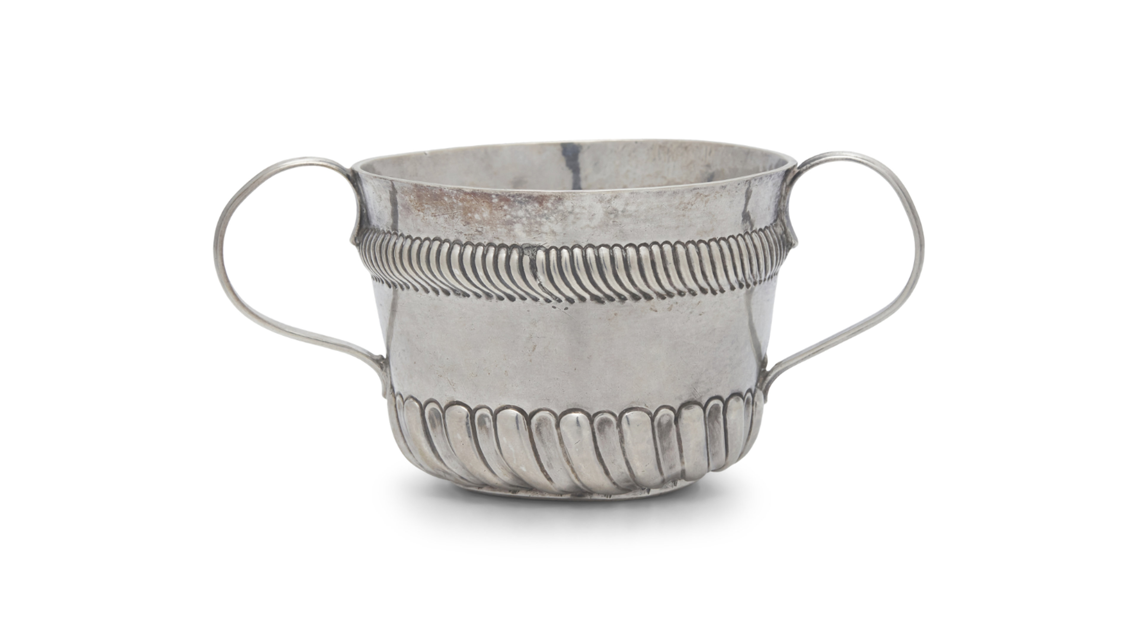 Lot 25 | A Silver Caudle Cup, John Coney (1655-1722), Boston, Massachusetts, Circa 1700
Sold for $32,000