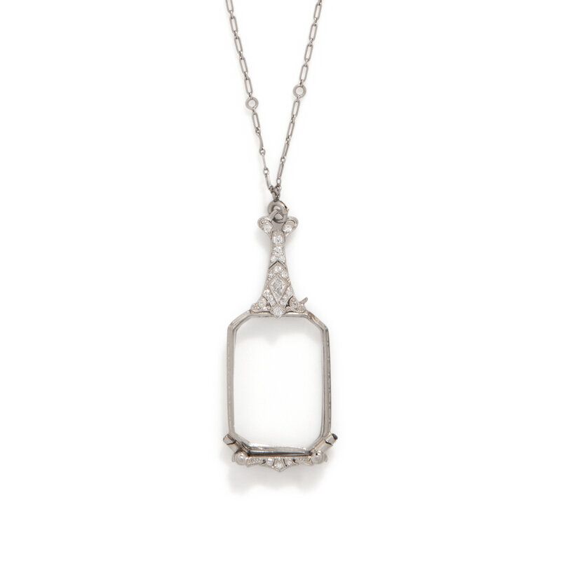 Lot 89 | EDWARDIAN, DIAMOND AND PLATINUM LORGNETTE WITH DIAMOND COLLET CHAIN | Estimate: $1,500 - 2,000