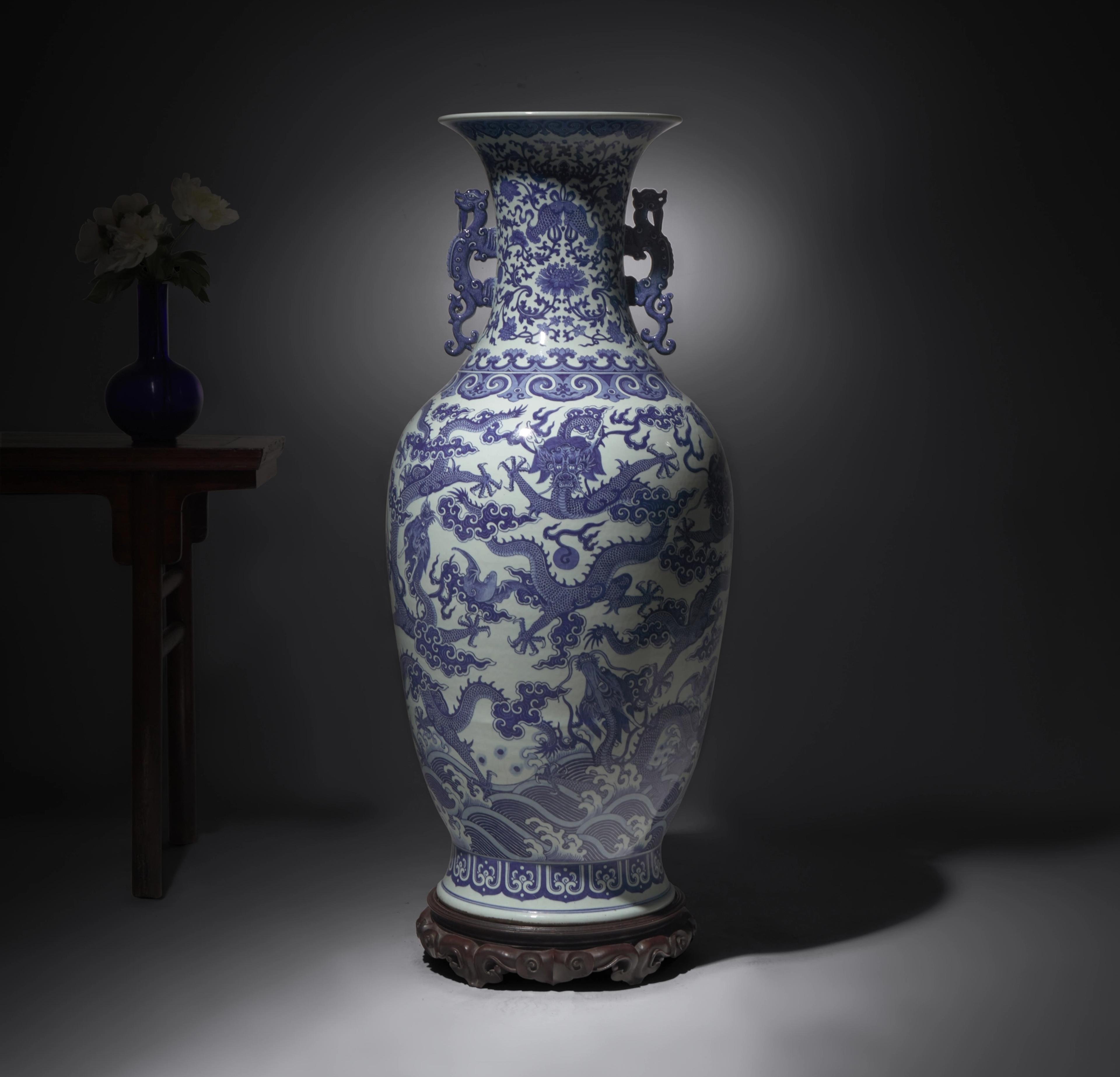 Lot 286 | A Magnificent, Monumental, and Extremely Rare Chinese Blue and White 'Nine Dragons' Vase, Qing Dynasty, Jiaqing/Daoguang Period 清嘉慶/道光 巨型青花九龍大瓶(附山中商會1943年圖錄 Estimate: $40,000 – $60,000
