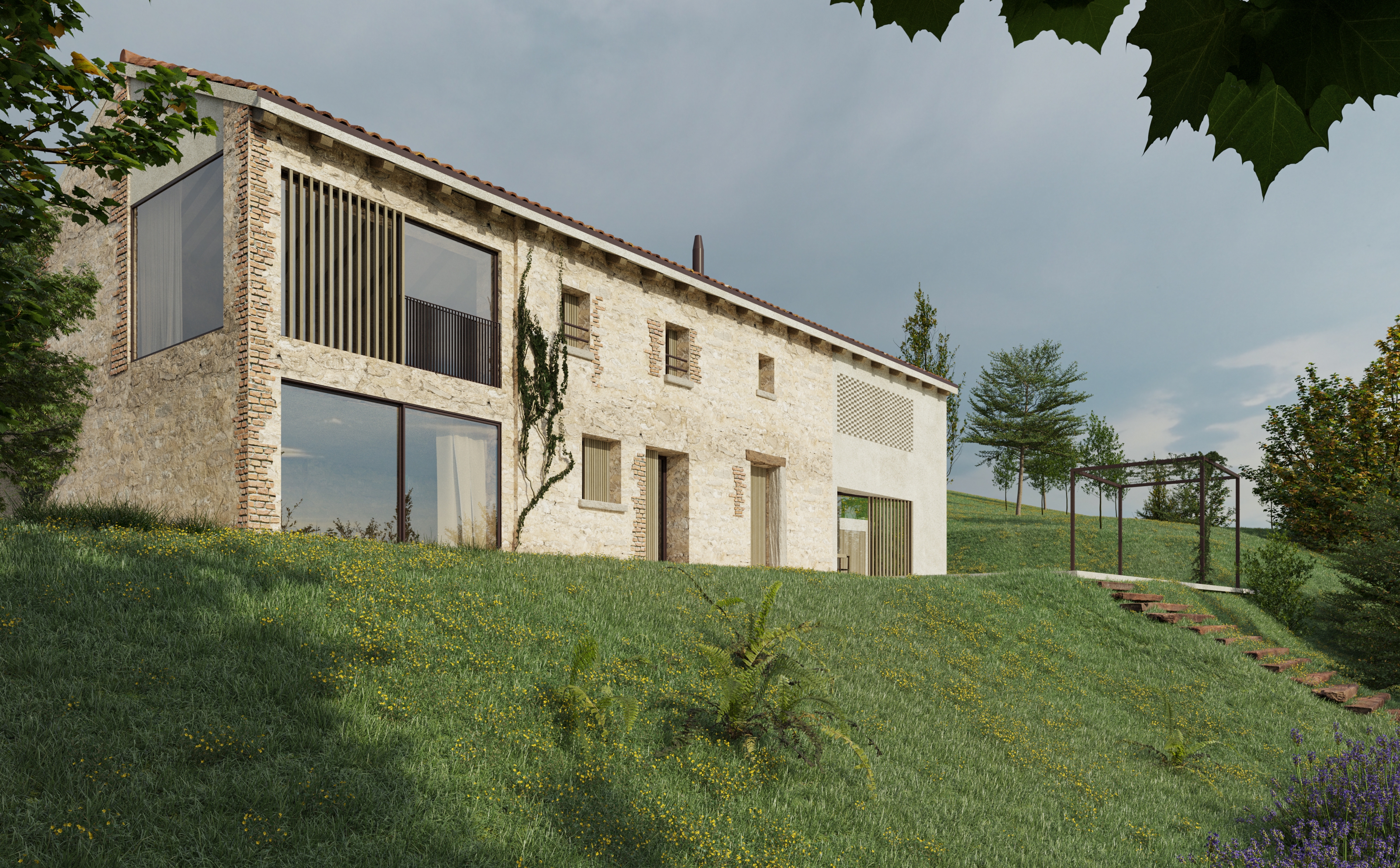 foto a colori di una residenza ristrutturata in collina