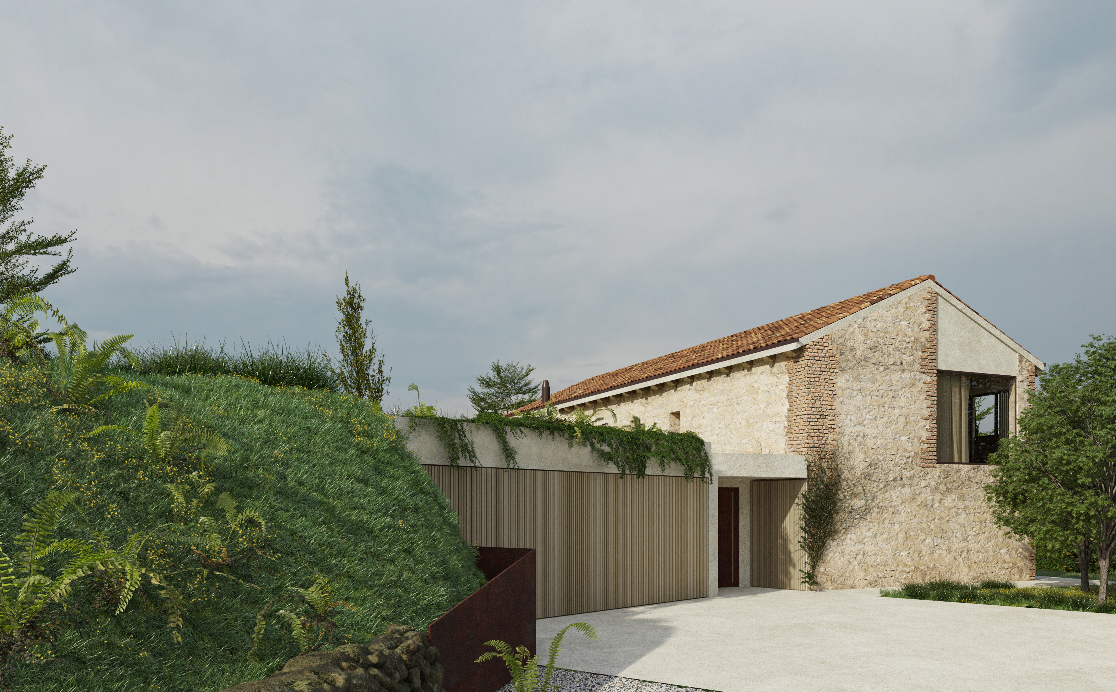 foto a colori di una residenza ristrutturata in collina