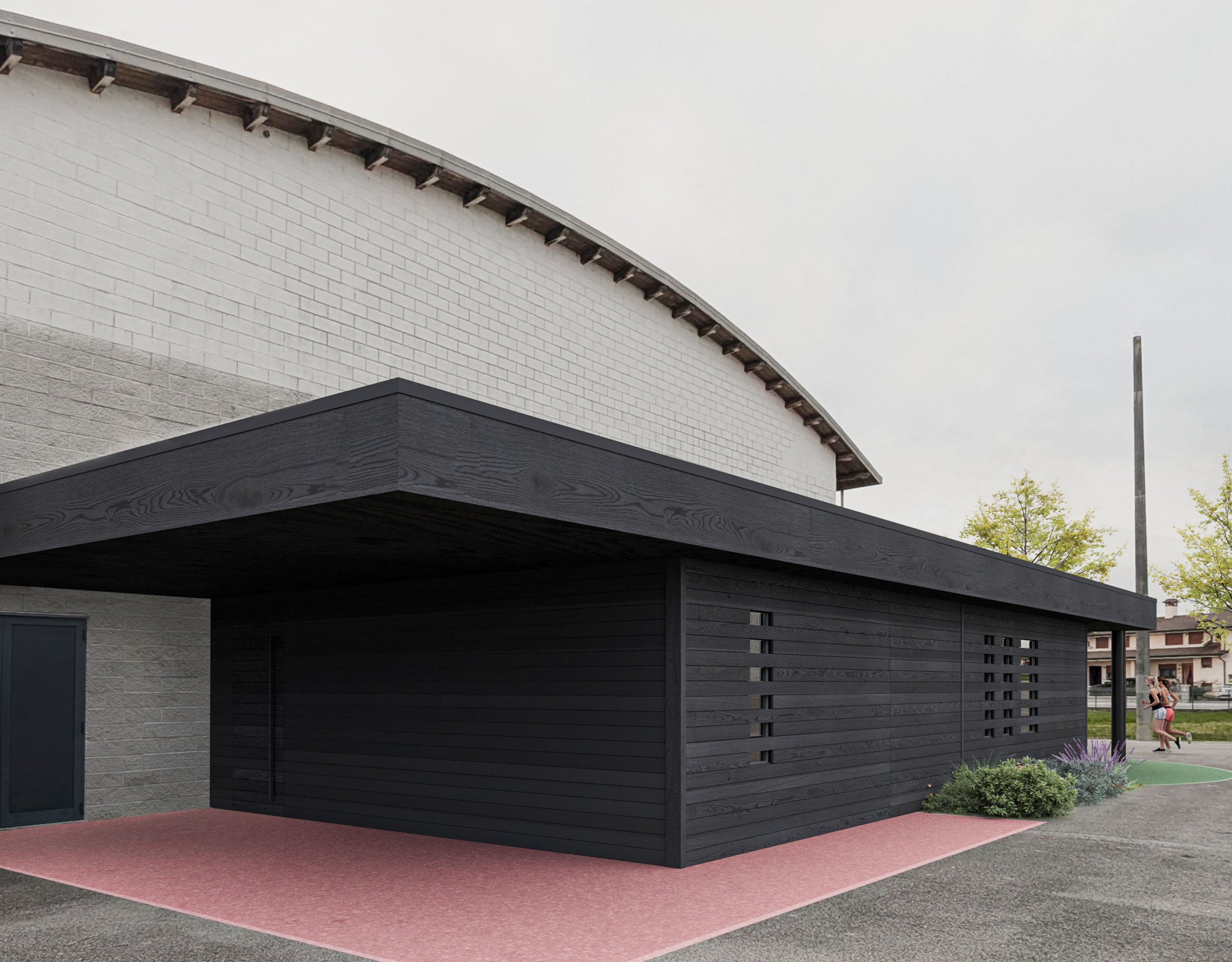 foto a colori di un edificio, palestra con ampliamento, sportivi che camminano vicino