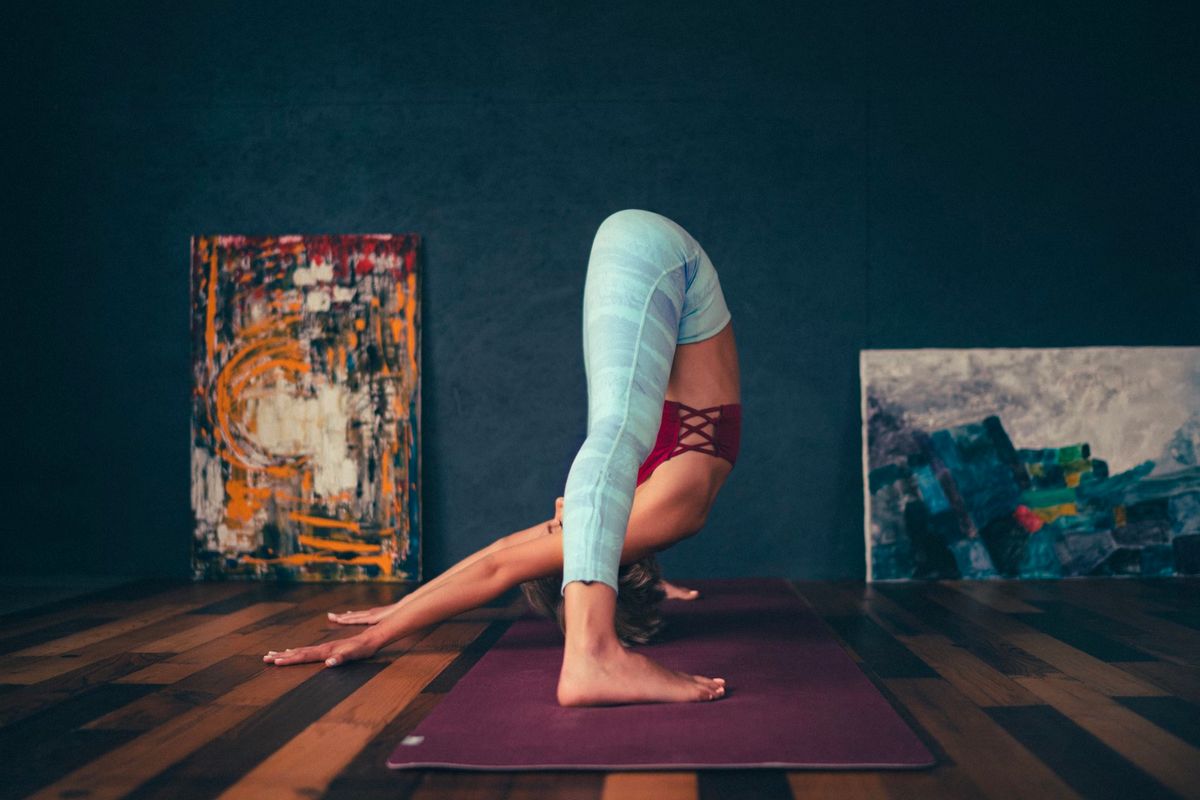 Woman in a standing forward bend