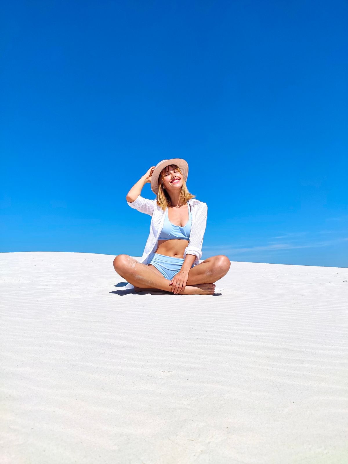 Woman in a seated twist on a mat
