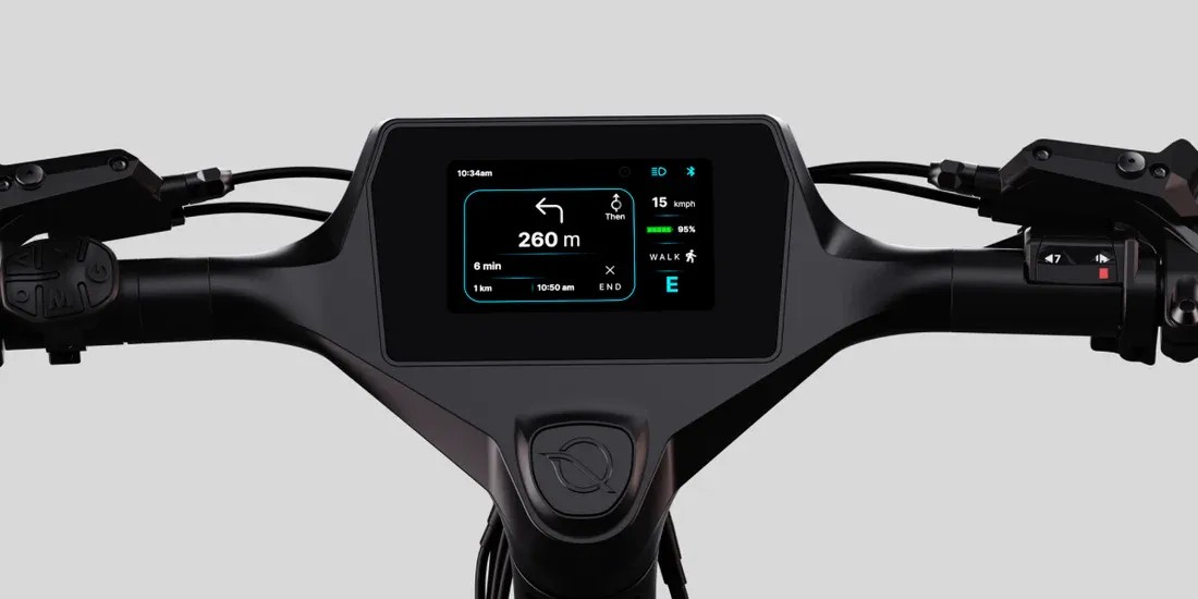 NINE09 eBike handlebar with the 4.3-inch smart dashboard showing turn-by-turn navigation