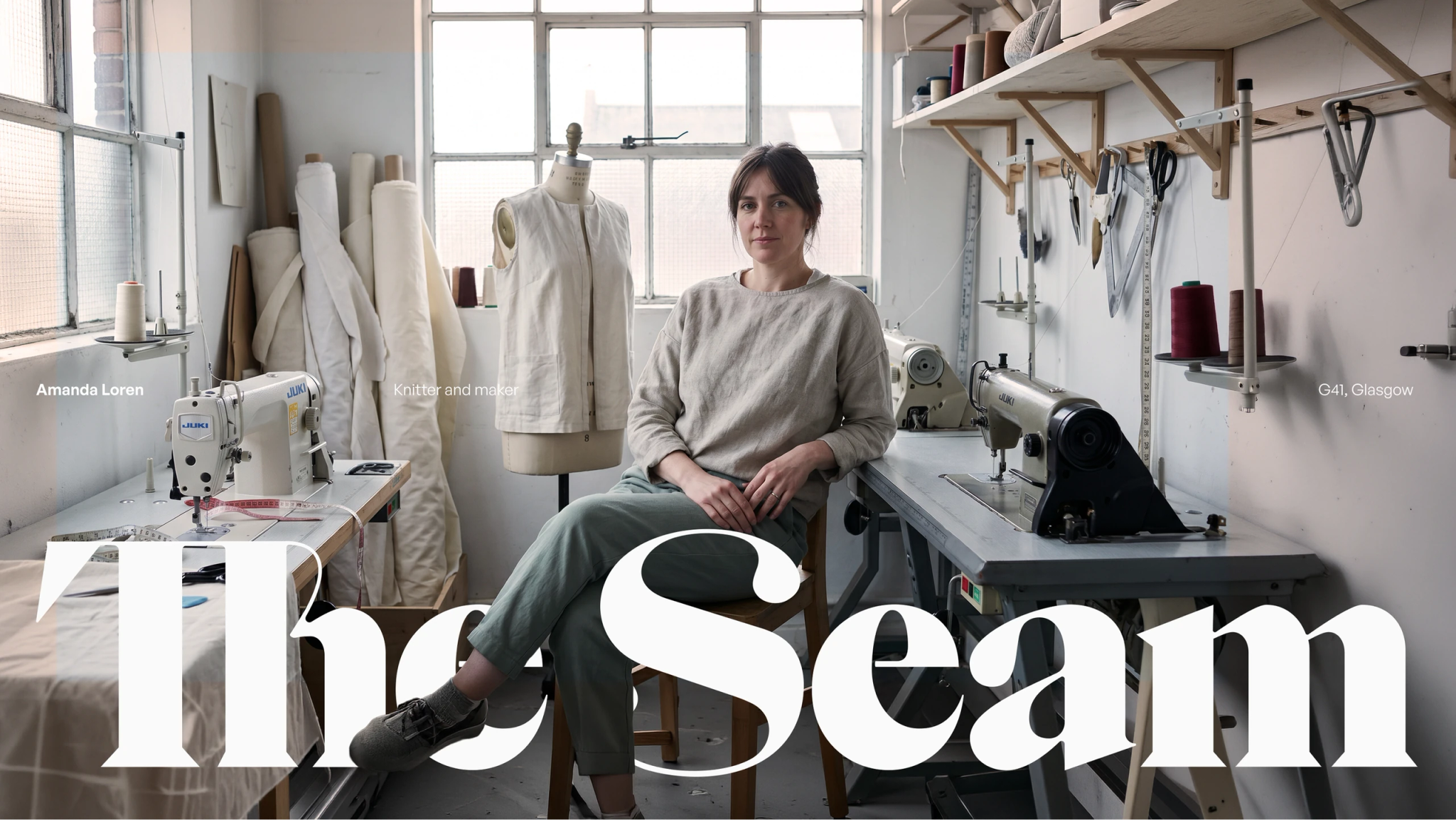 The Seam — a maker at her studio bench beneath the wordmark