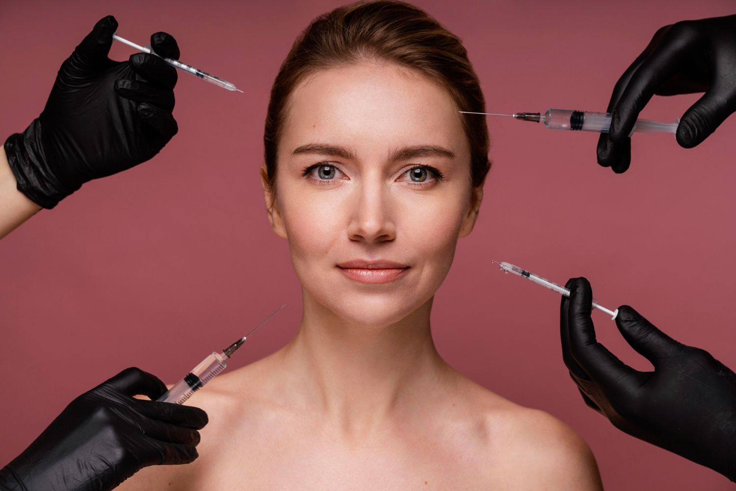 Close-up of a woman in her 30s smiling confidently after preventative anti-wrinkle treatment at Marr Laser & Skin Clinic