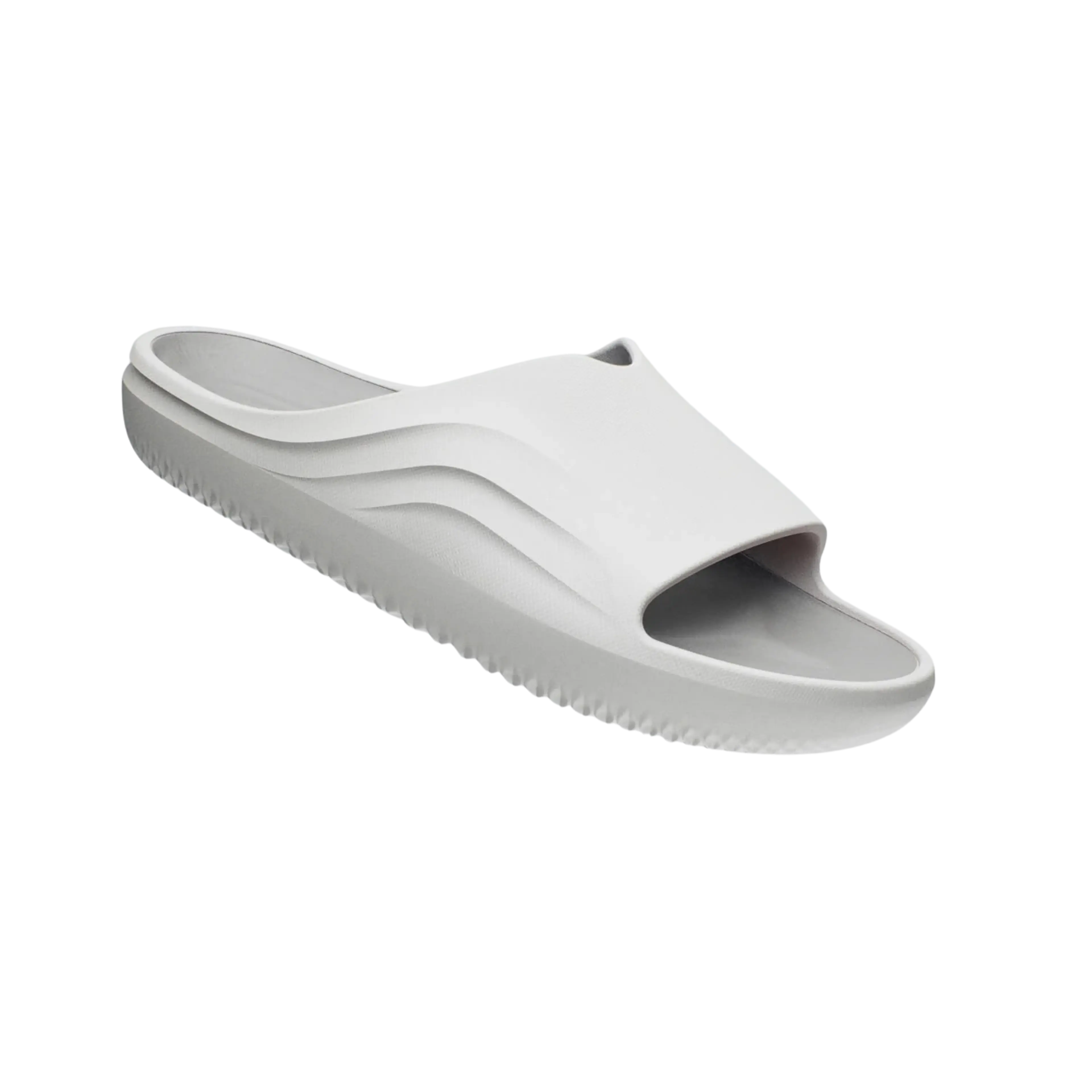 A single white and light grey slide sandal with a wavy strap design and thick sole.