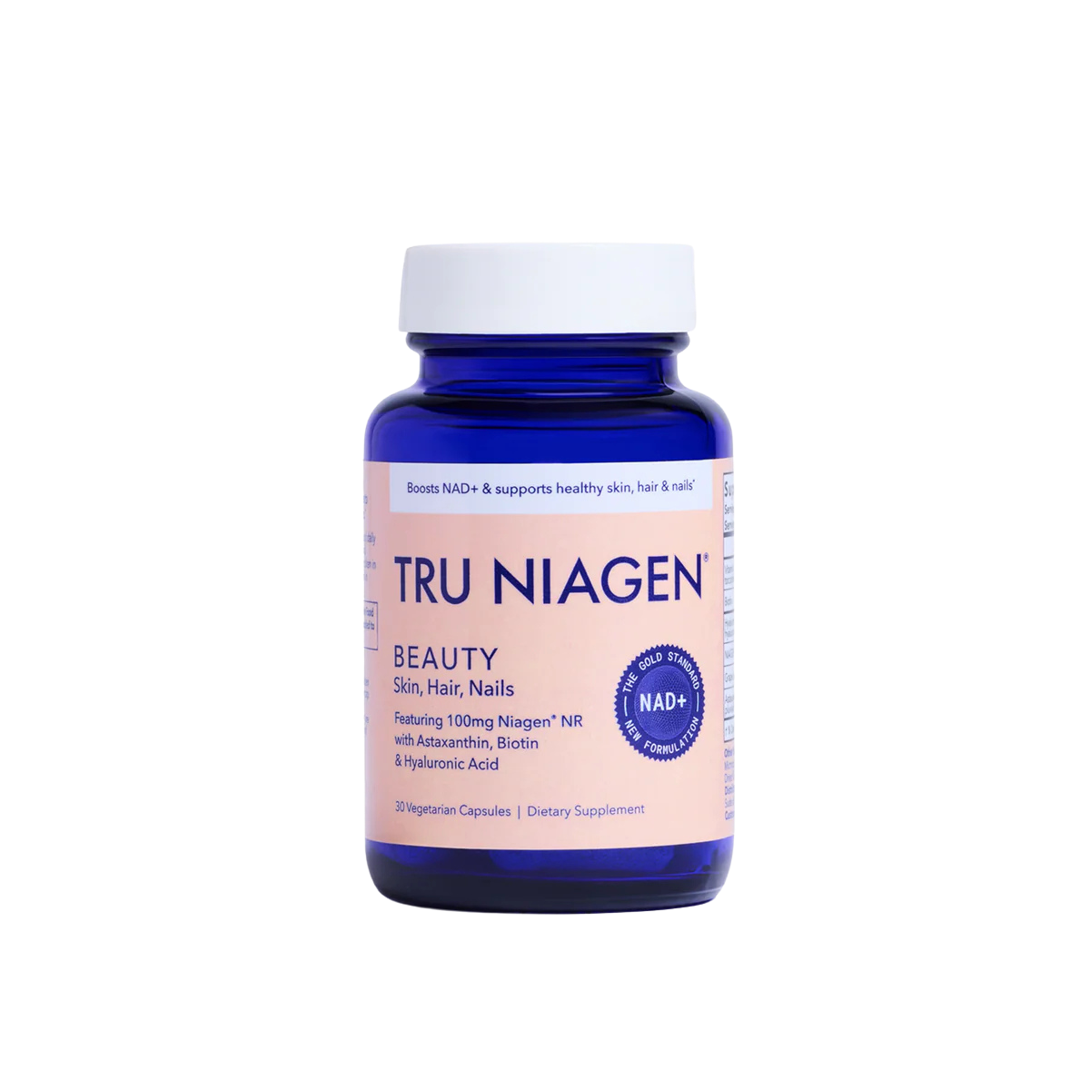 Blue bottle of Tru Niagen Beauty supplement for skin, hair, and nails with a white cap.