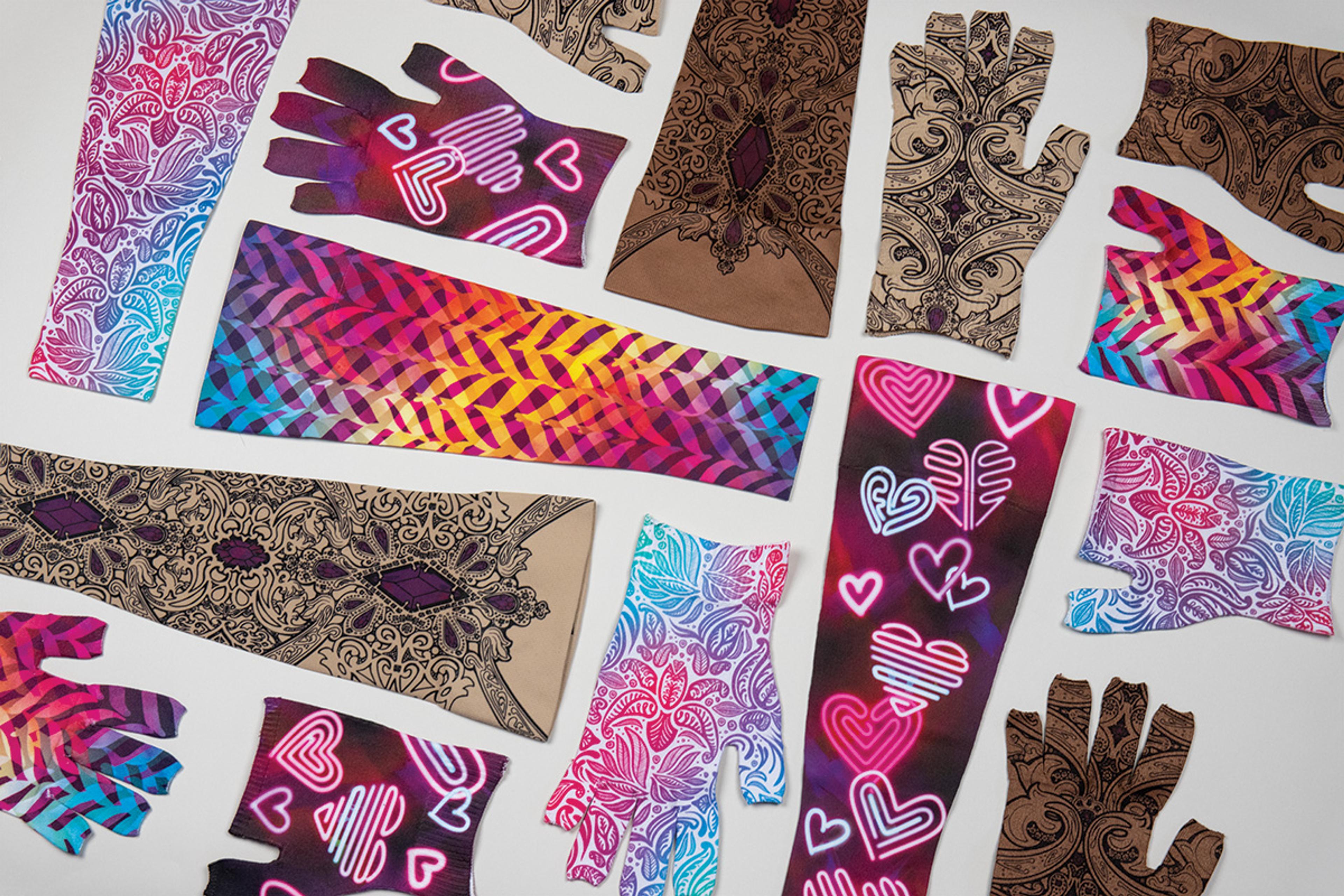 Assortment of patterned fingerless gloves and arm sleeves, featuring designs like colorful paisleys, geometric stripes, and neon hearts.