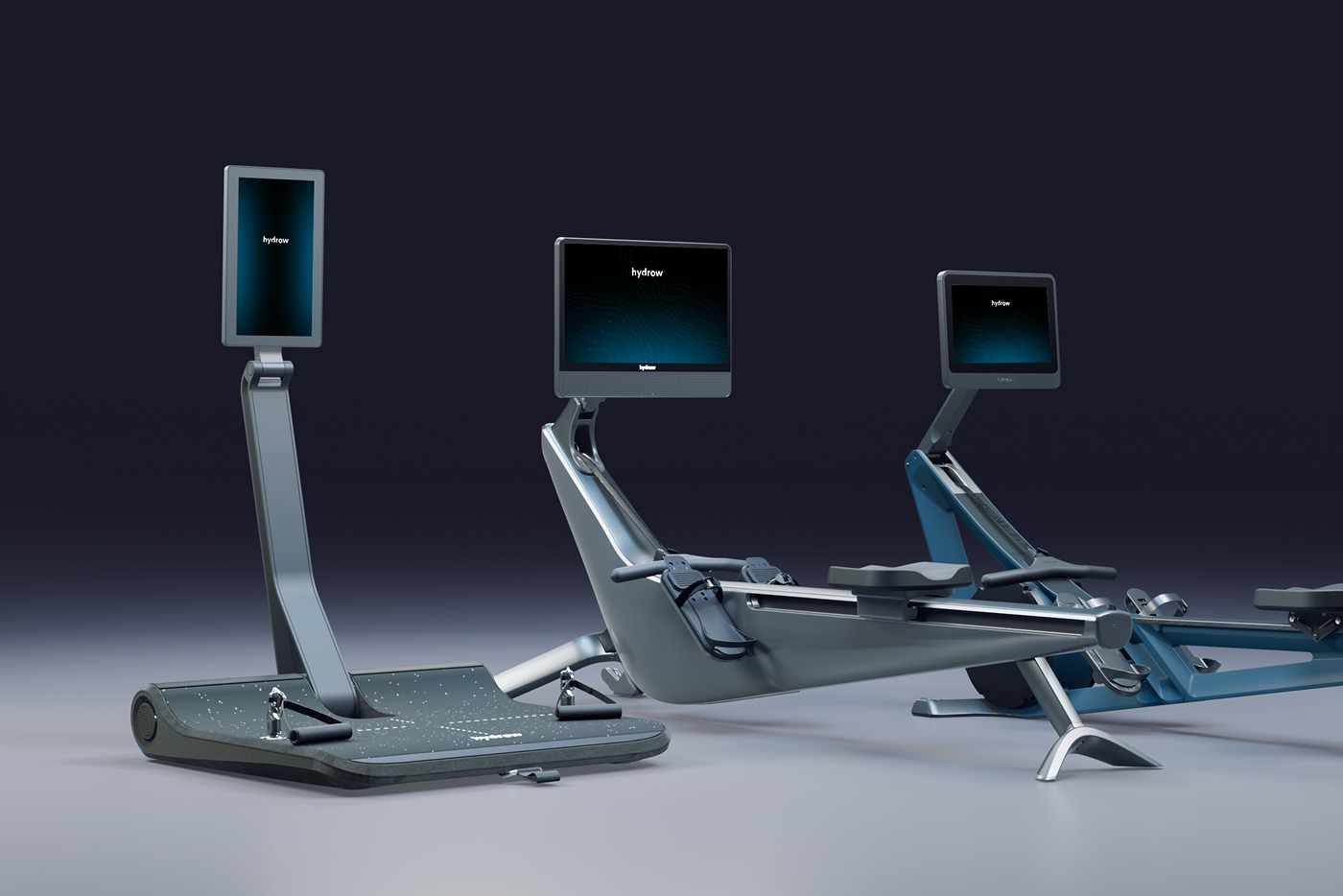 Three modern Hydrow exercise machines: a standing workout platform and two rowing machines, all with digital displays.