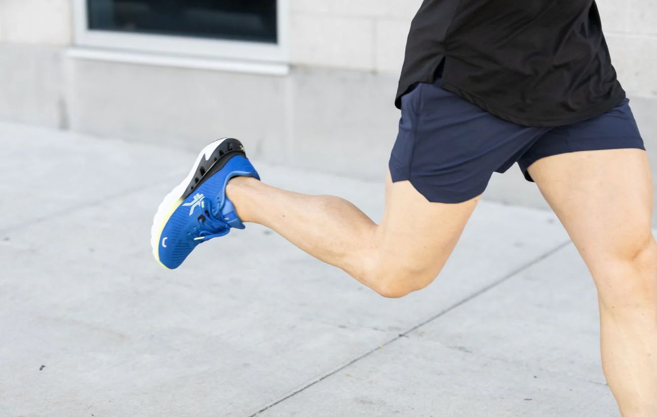 Man wearing KURU shoes on concrete