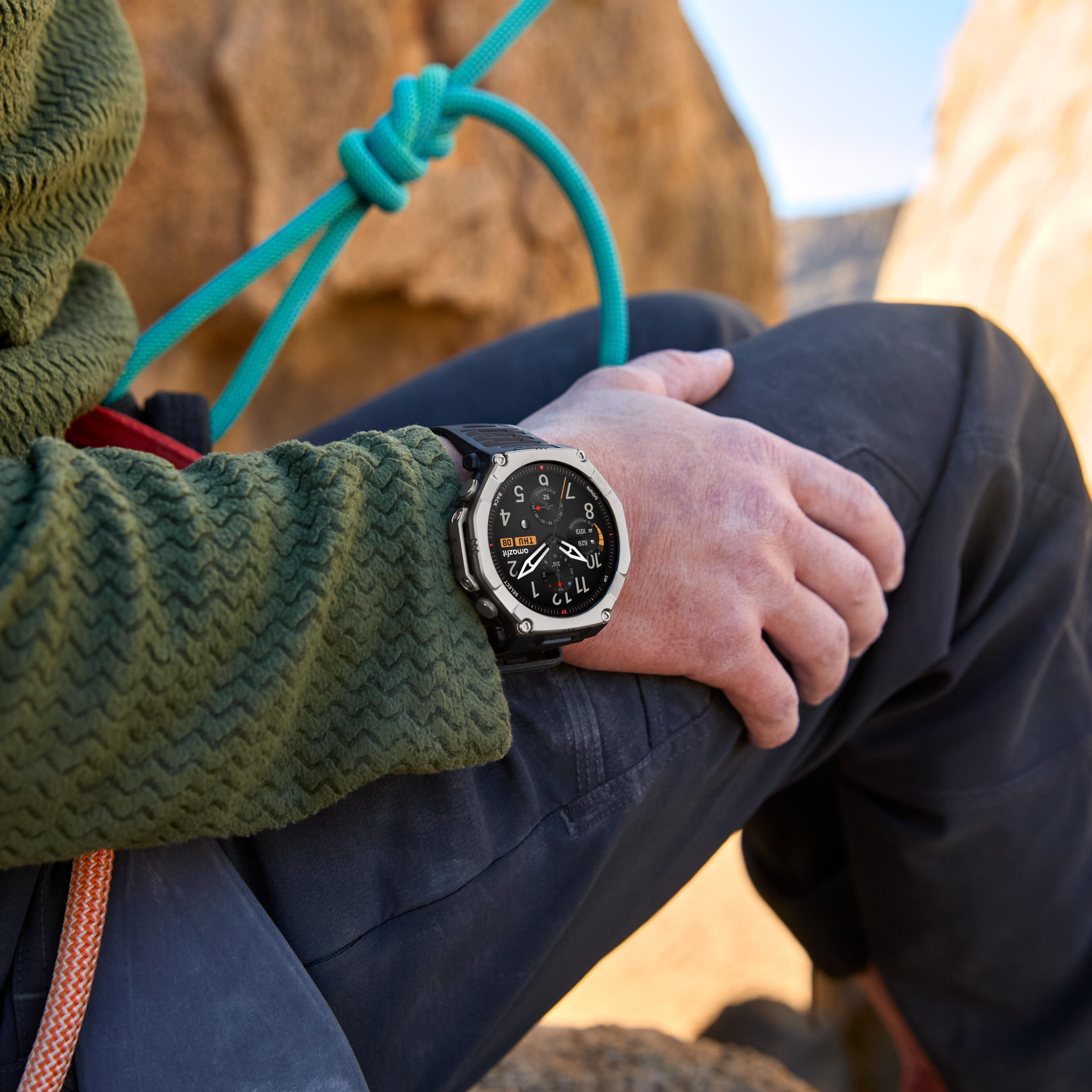 A person's wrist wearing amazfit smartwatch with a climbing rope visible.