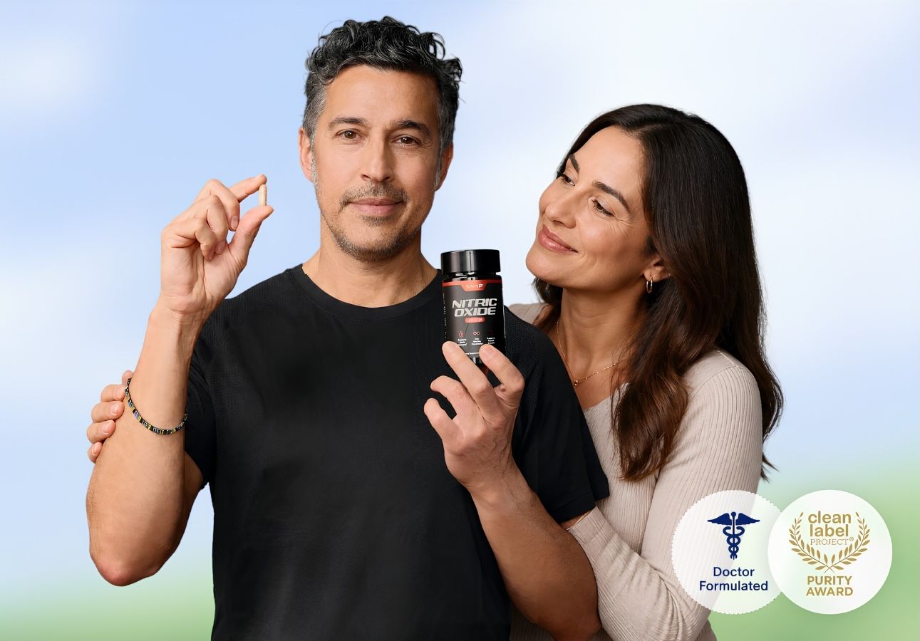 A smiling man holds a pouch of SNAP Prostate Health Soft Chews and another of SNAP Nitric Oxide Beet Soft Chews.