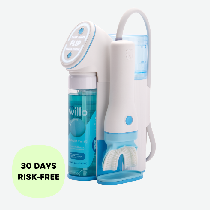 A white and light blue Willo automatic tooth brushing device with a blue Bubble Twist refill bottle and a "30 DAYS RISK-FREE" badge.