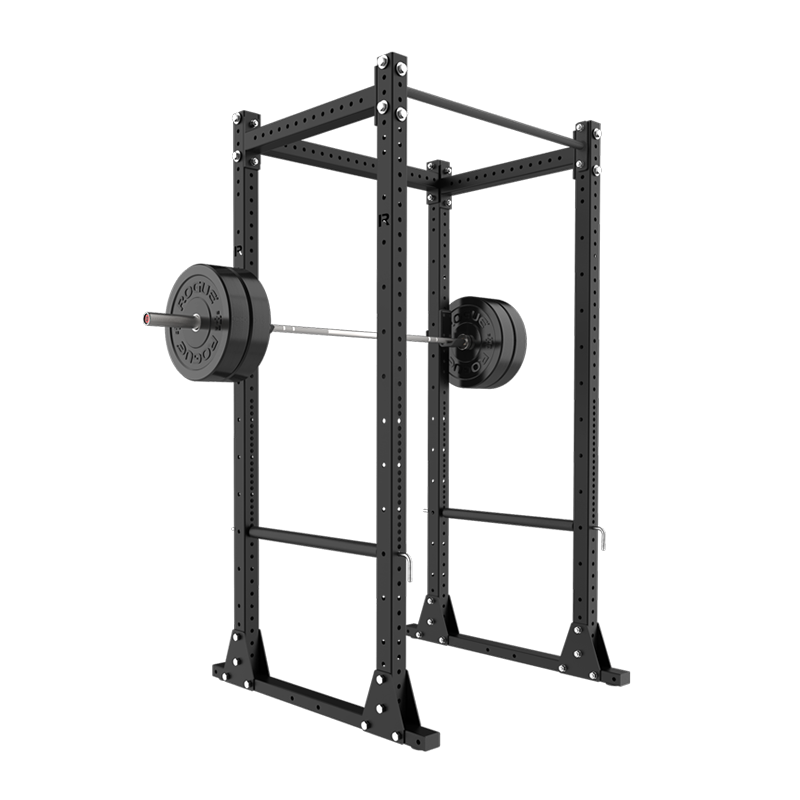 A black power rack with a barbell loaded with weight plates.