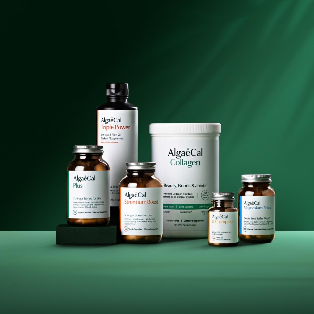 AlgaeCal supplements: Triple Power, Plus, StrontiumBoost, Collagen, D3 Complete, and Magnesium Relax, arranged on a green background.