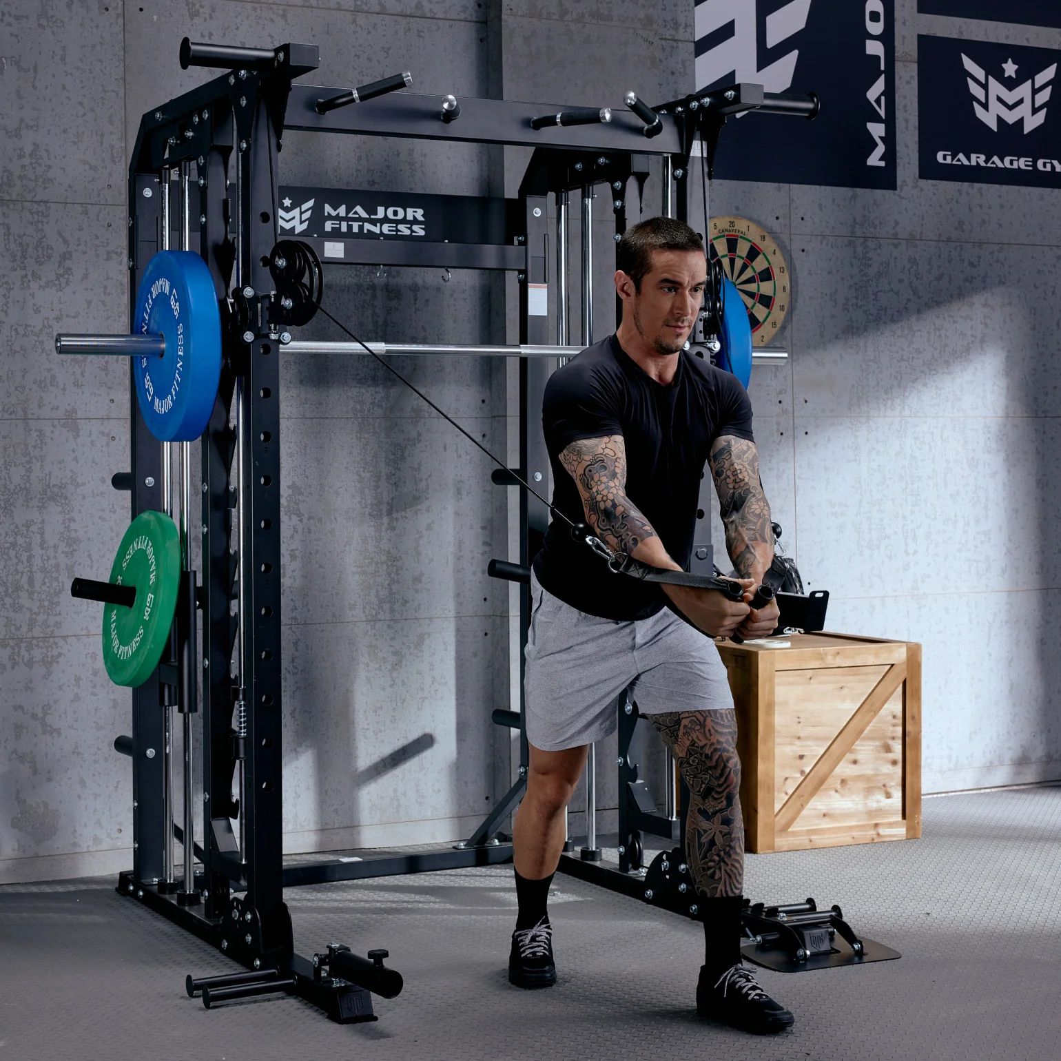 Man working out using Major Fitness machine
