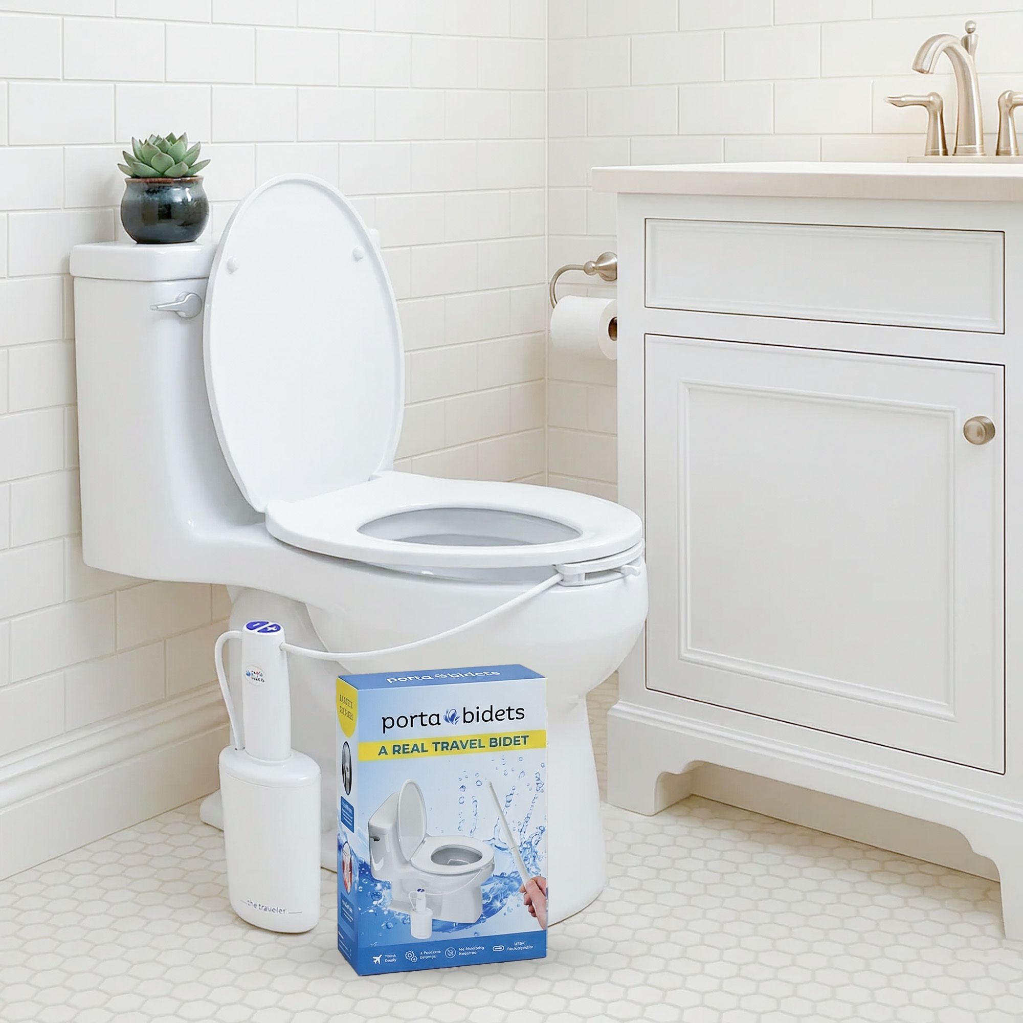 A toilet with a bidet attachment, next to a portable bidet device and a "Porta Bidets" product box in a white bathroom.