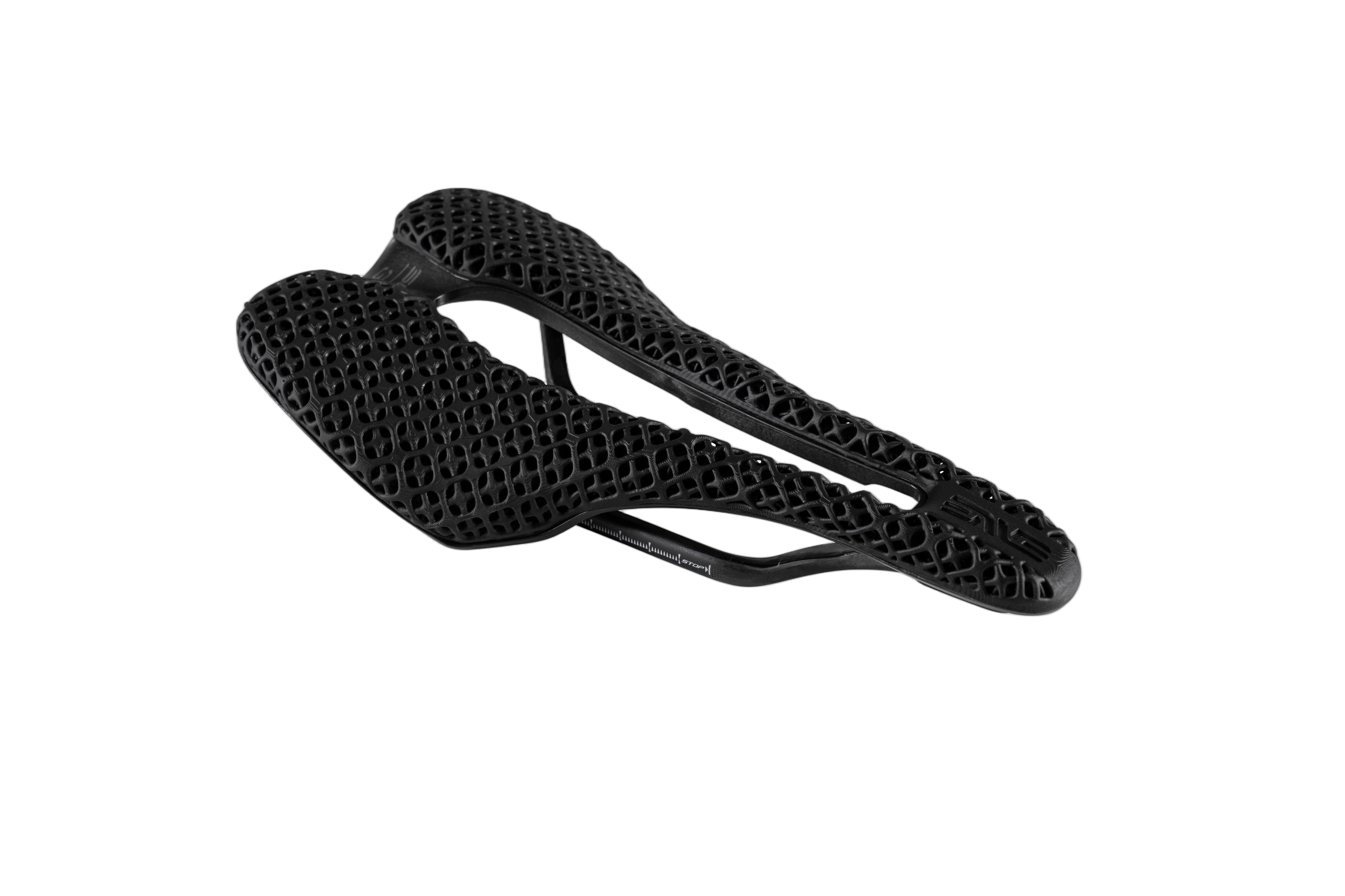 Black road bike saddle with 3D printed cushioning pattern, top view