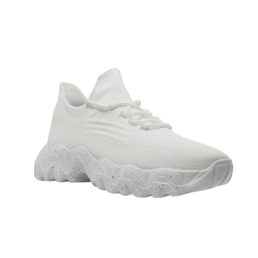 White knit sneaker with a chunky, speckled wavy sole.
