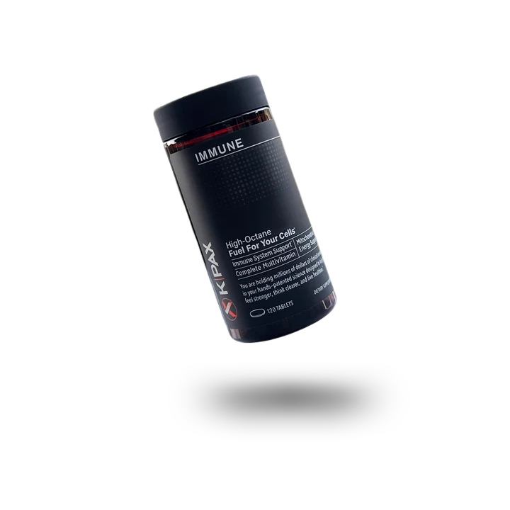 Dark KPAX IMMUNE multivitamin bottle floating.