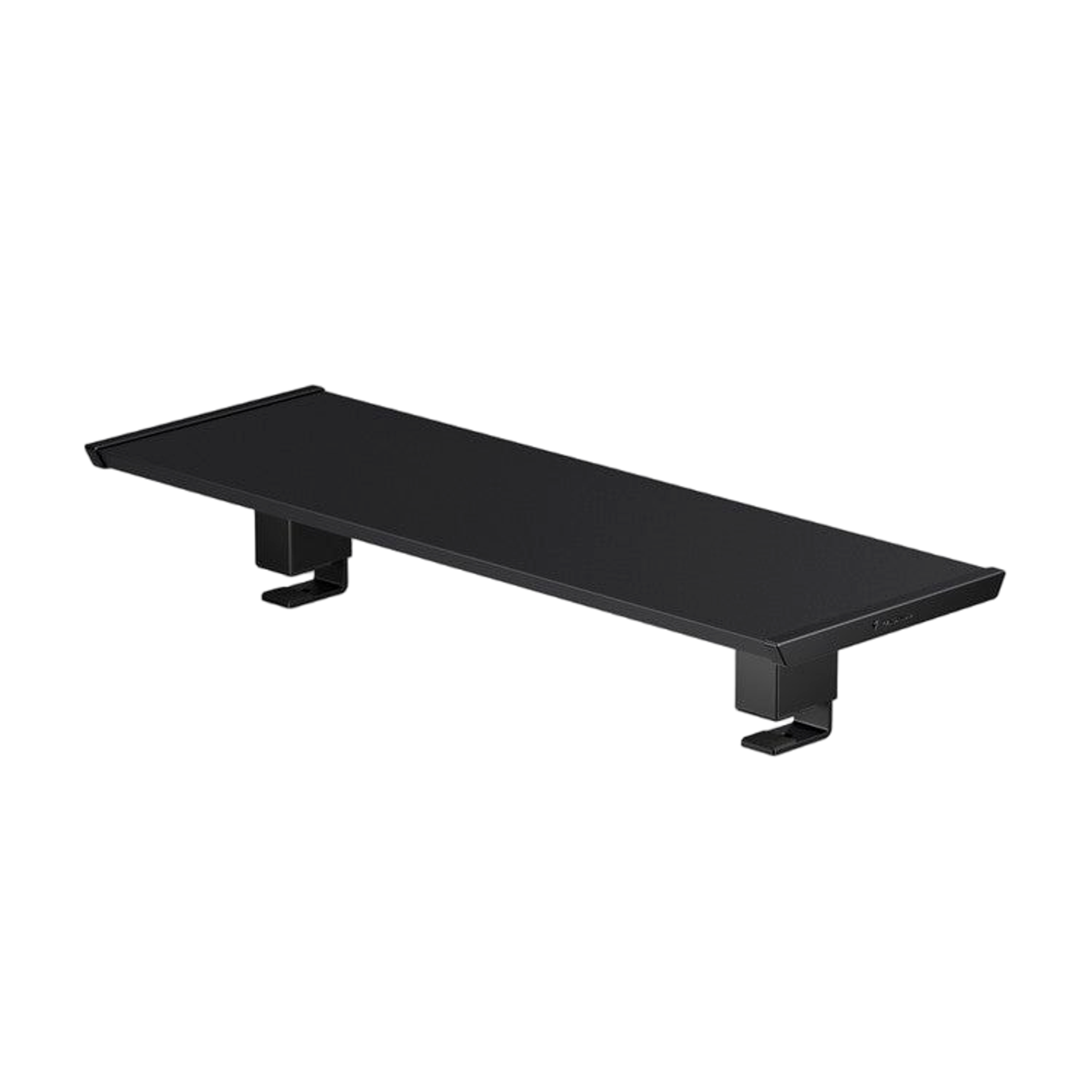 Black MAGNUS desk riser mounted on desk