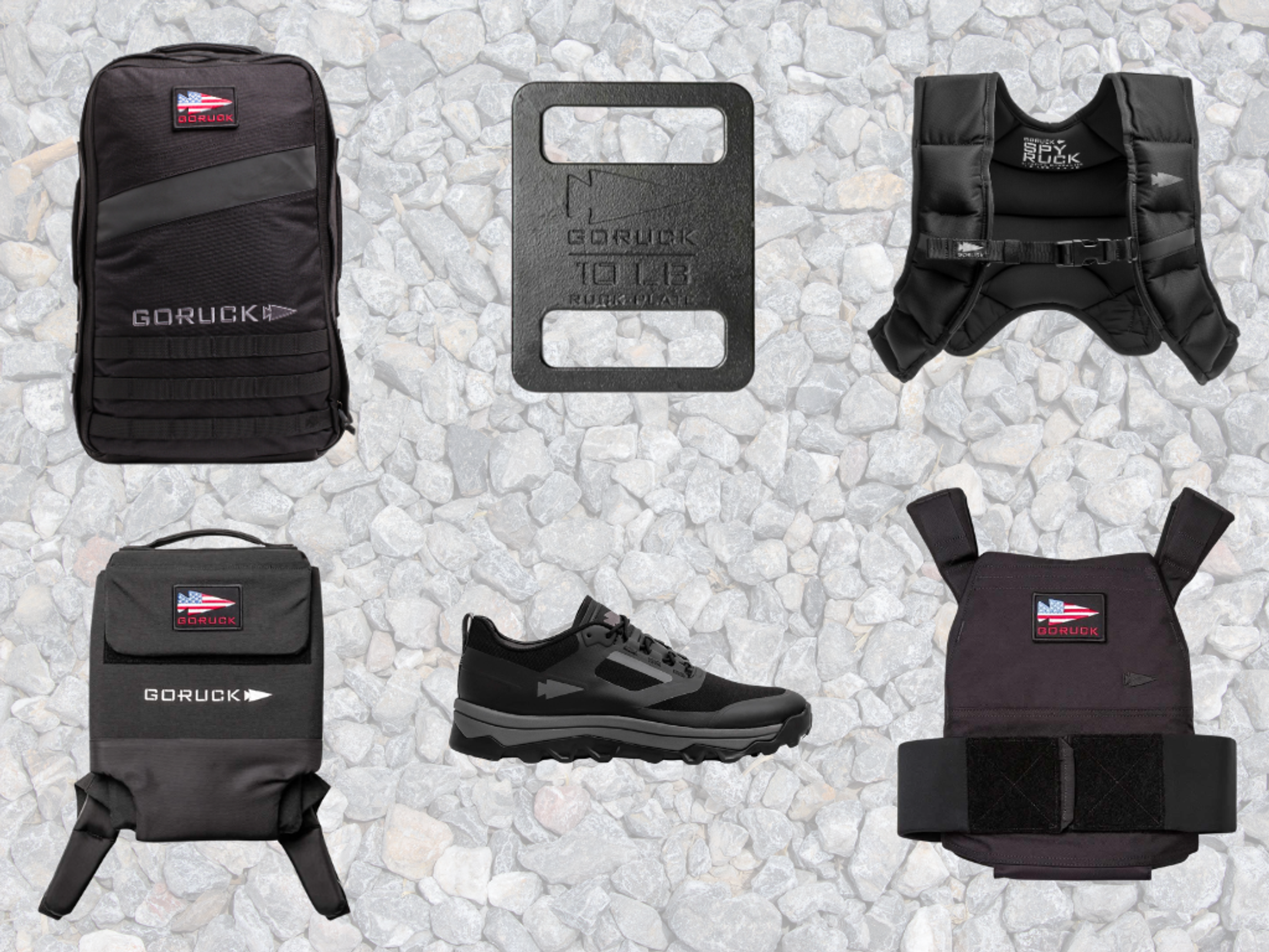 A collection of black GORUCK fitness and tactical gear, including backpacks, weighted vests, a weight plate, and a shoe, displayed on a gravel background.