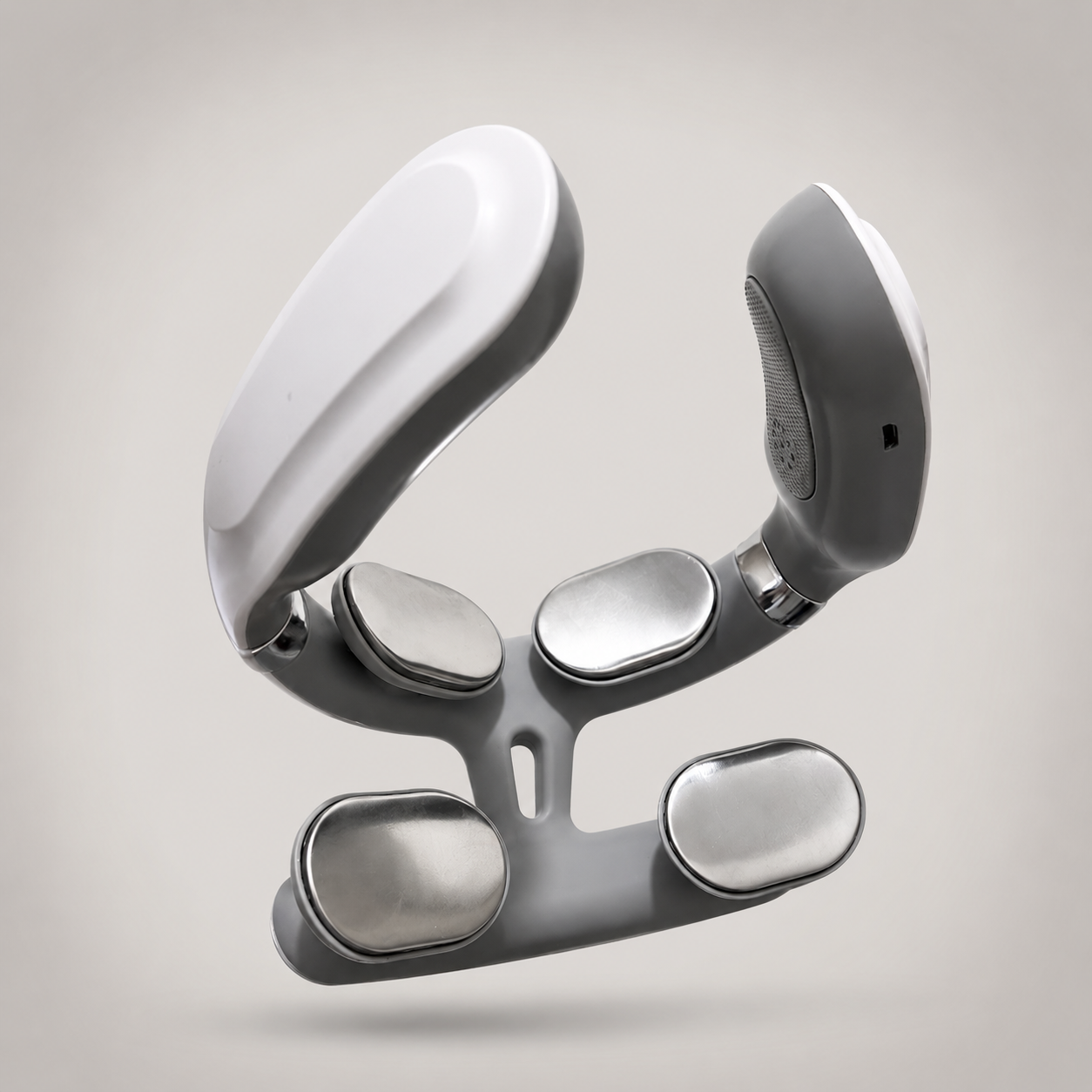 A grey and white U-shaped neck massager with silver contact pads.