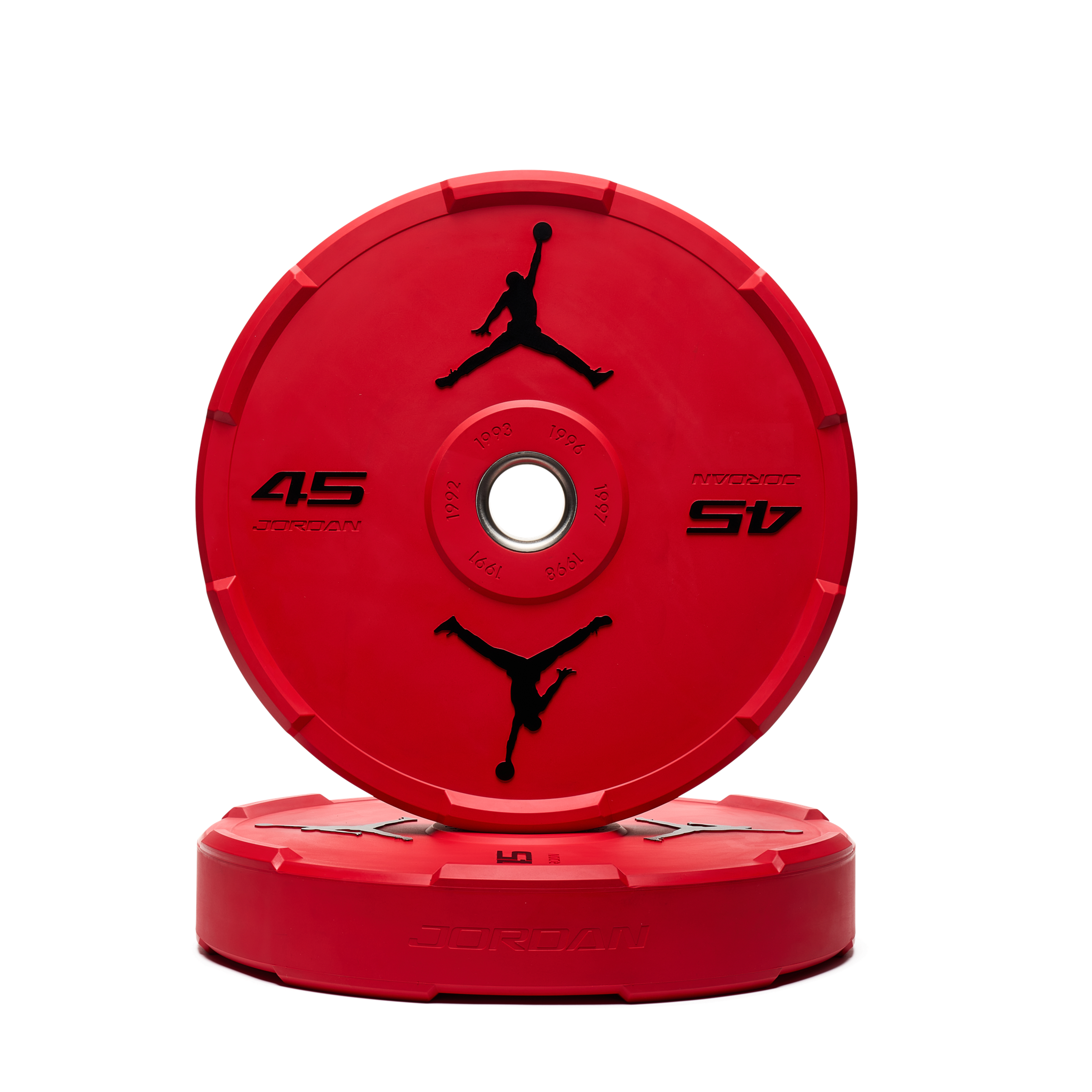 Pair of black bumper plates stacked together