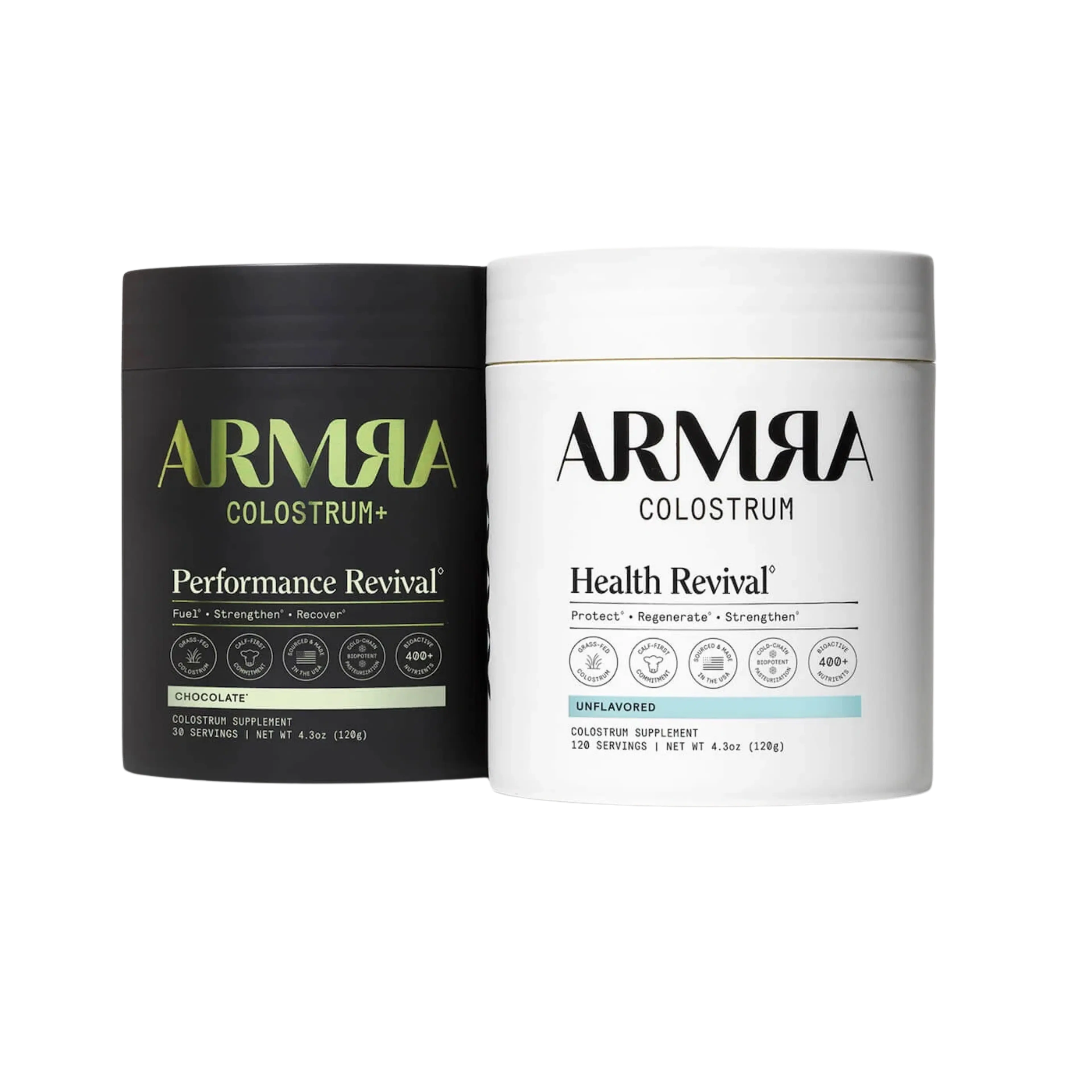 Two tubs of ARMRA Colostrum supplements, one black with green text for "Performance Revival" chocolate flavored, and one white with black text for "Health Revival" unflavored.