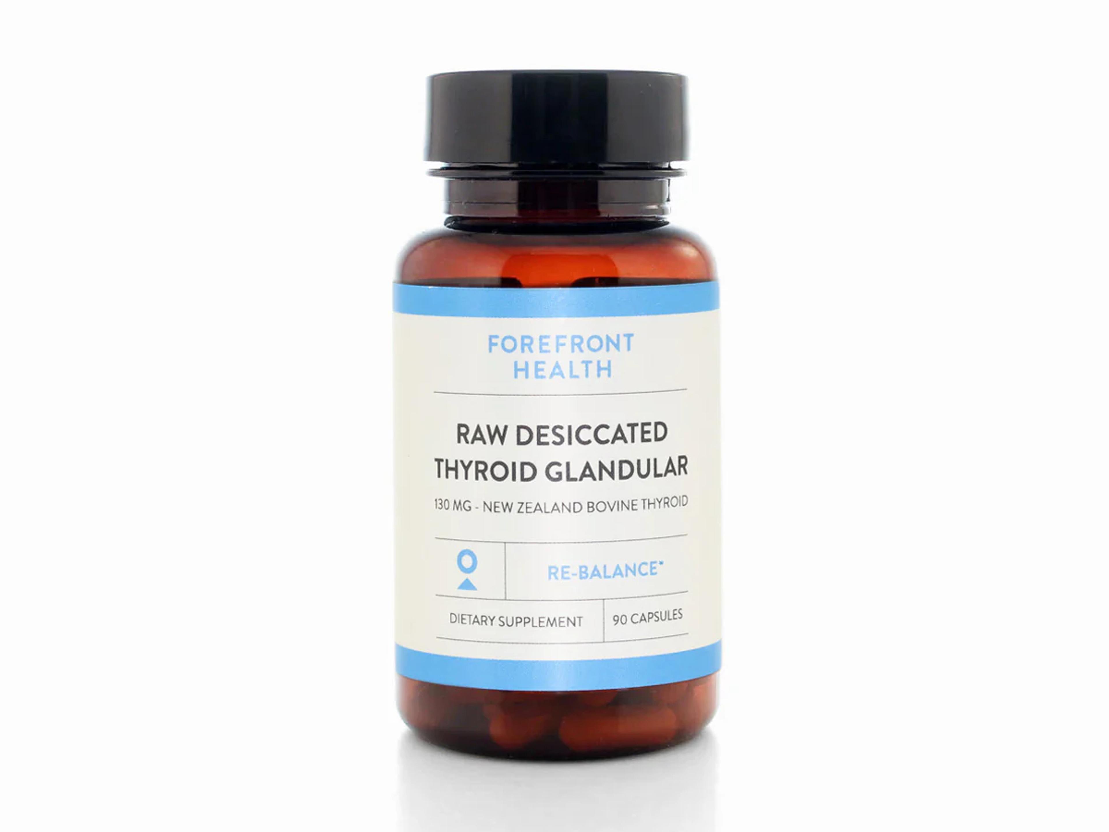 A brown bottle of Forefront Health Raw Desiccated Thyroid Glandular dietary supplement.