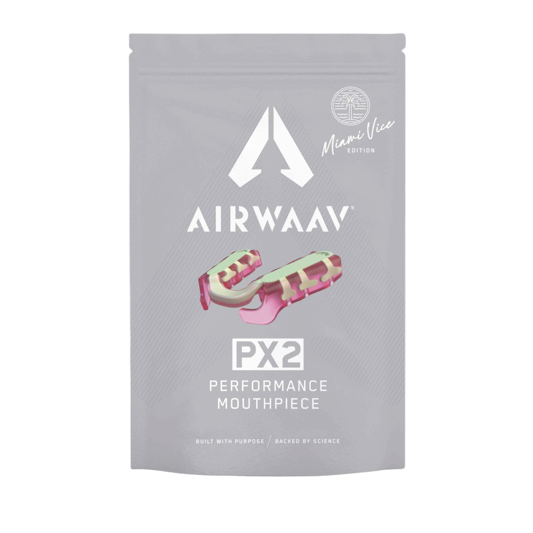 AIRWAAV PX2 mouthpiece in Miami Vice pink and mint colors