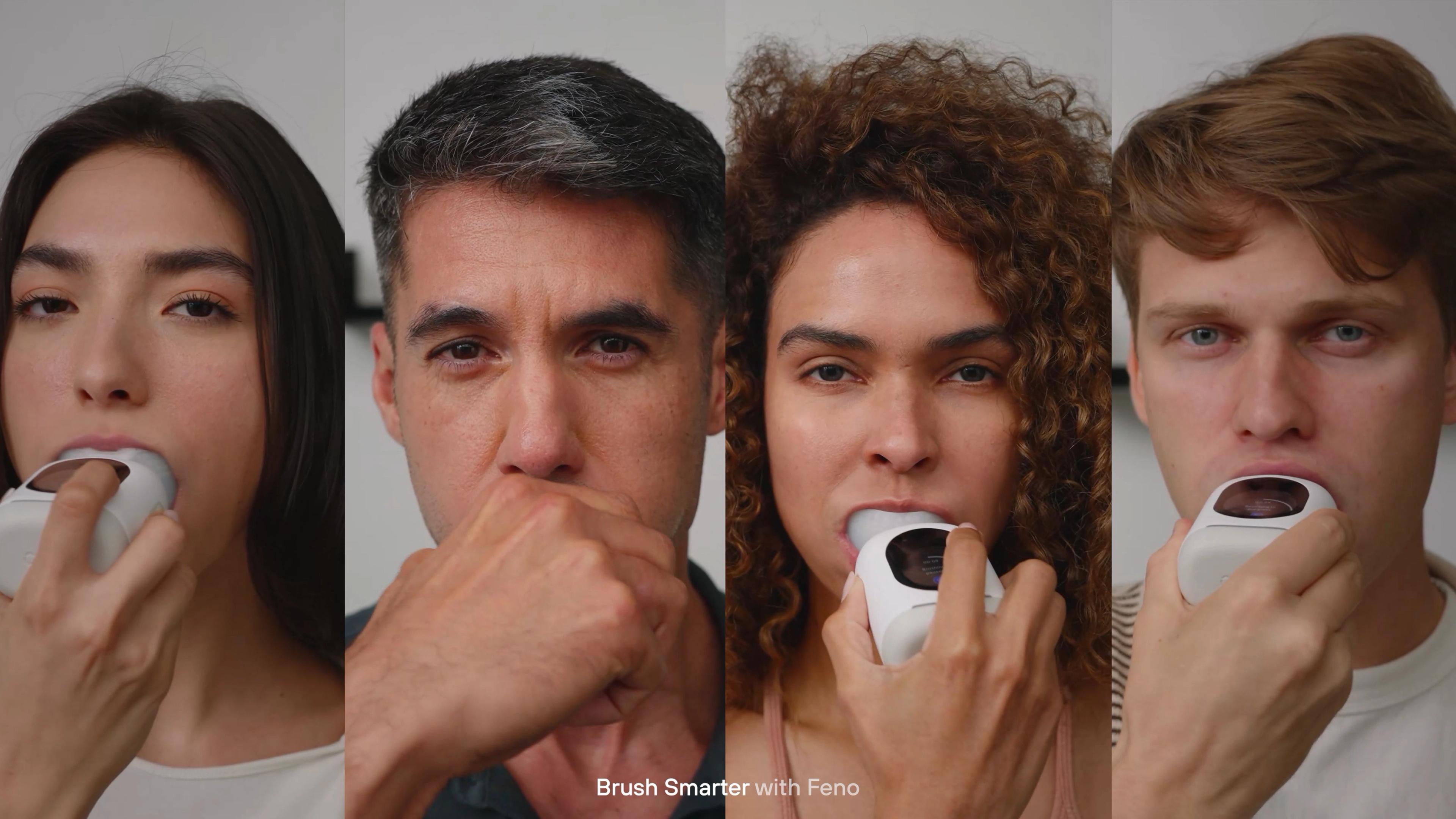 Four diverse people, three using a white Feno automatic toothbrush in their mouths. Text: Brush Smarter with Feno.