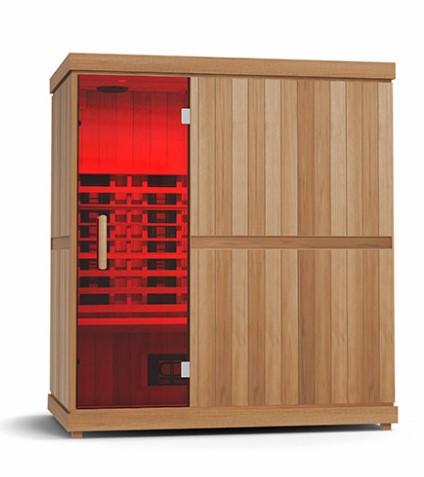 Wooden infrared sauna with a red glow visible through its glass door.