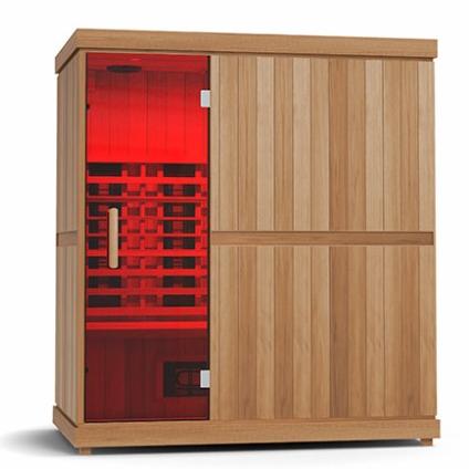 Wooden infrared sauna with a red glow visible through its glass door.