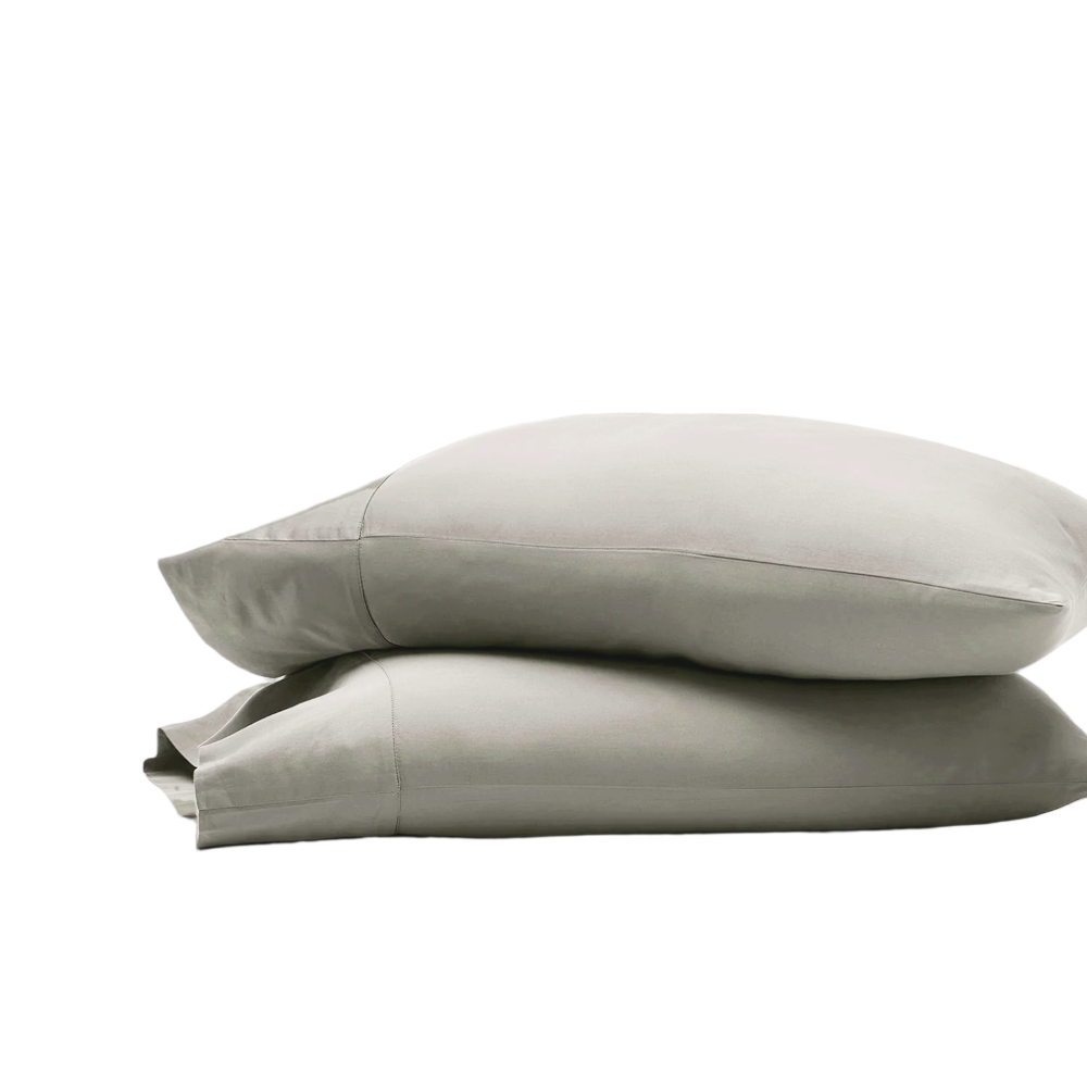 Stack of folded white eucalyptus pillowcases