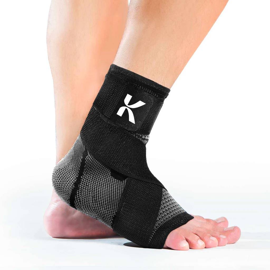 Black ankle brace with a white 'X' logo worn on a person's foot.