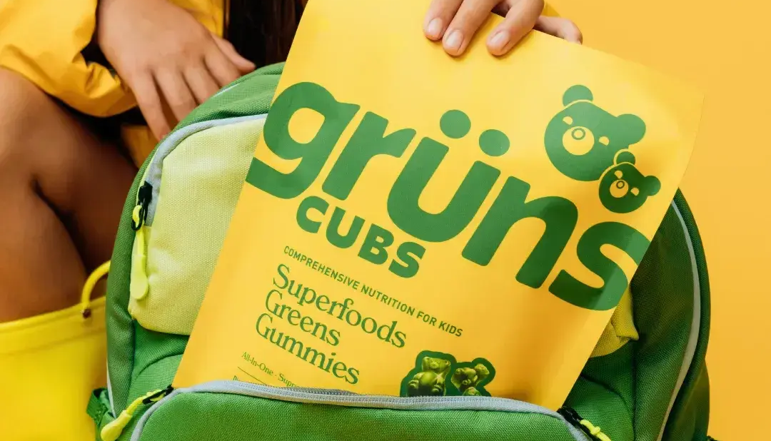 Gruns Cubs product being pulled out of book bag