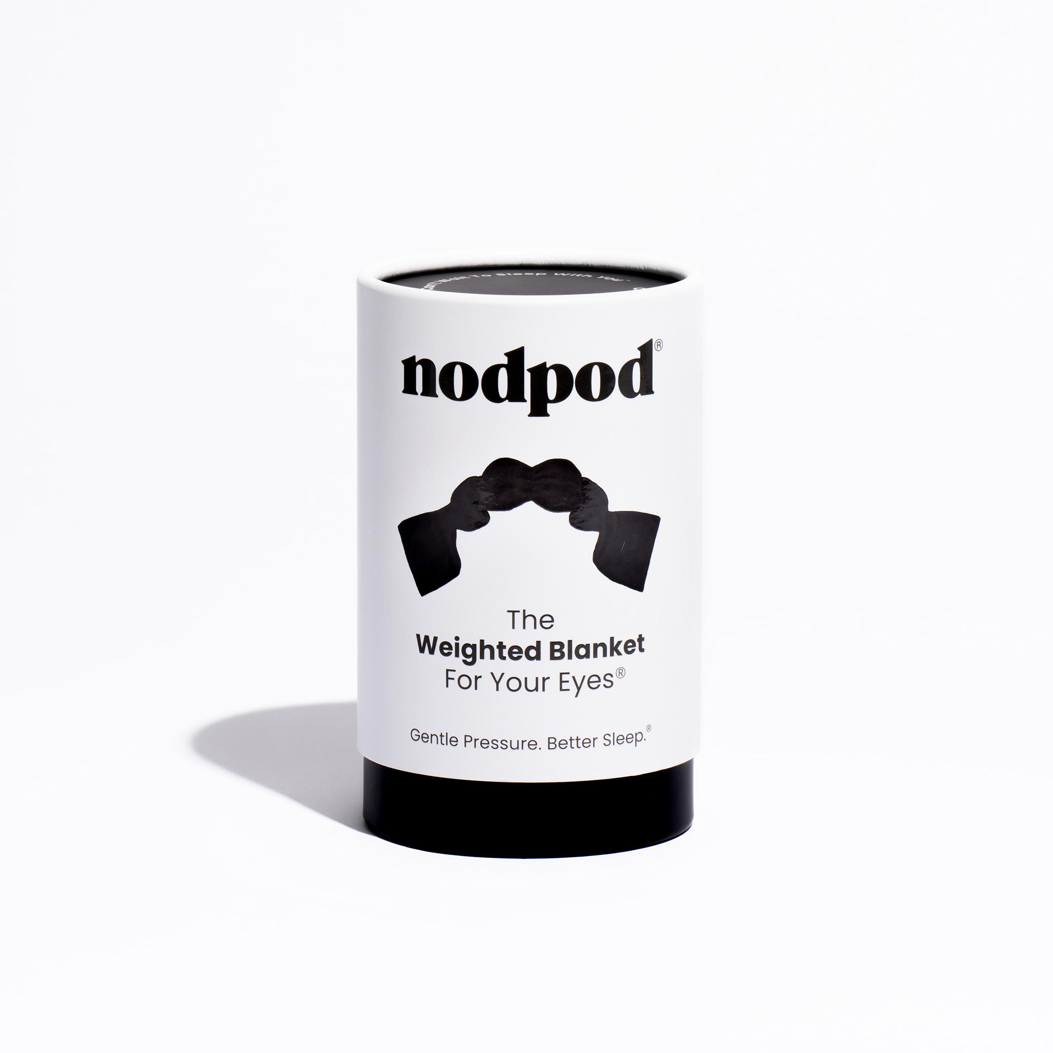 White cylindrical nodpod package with text "The Weighted Blanket For Your Eyes."